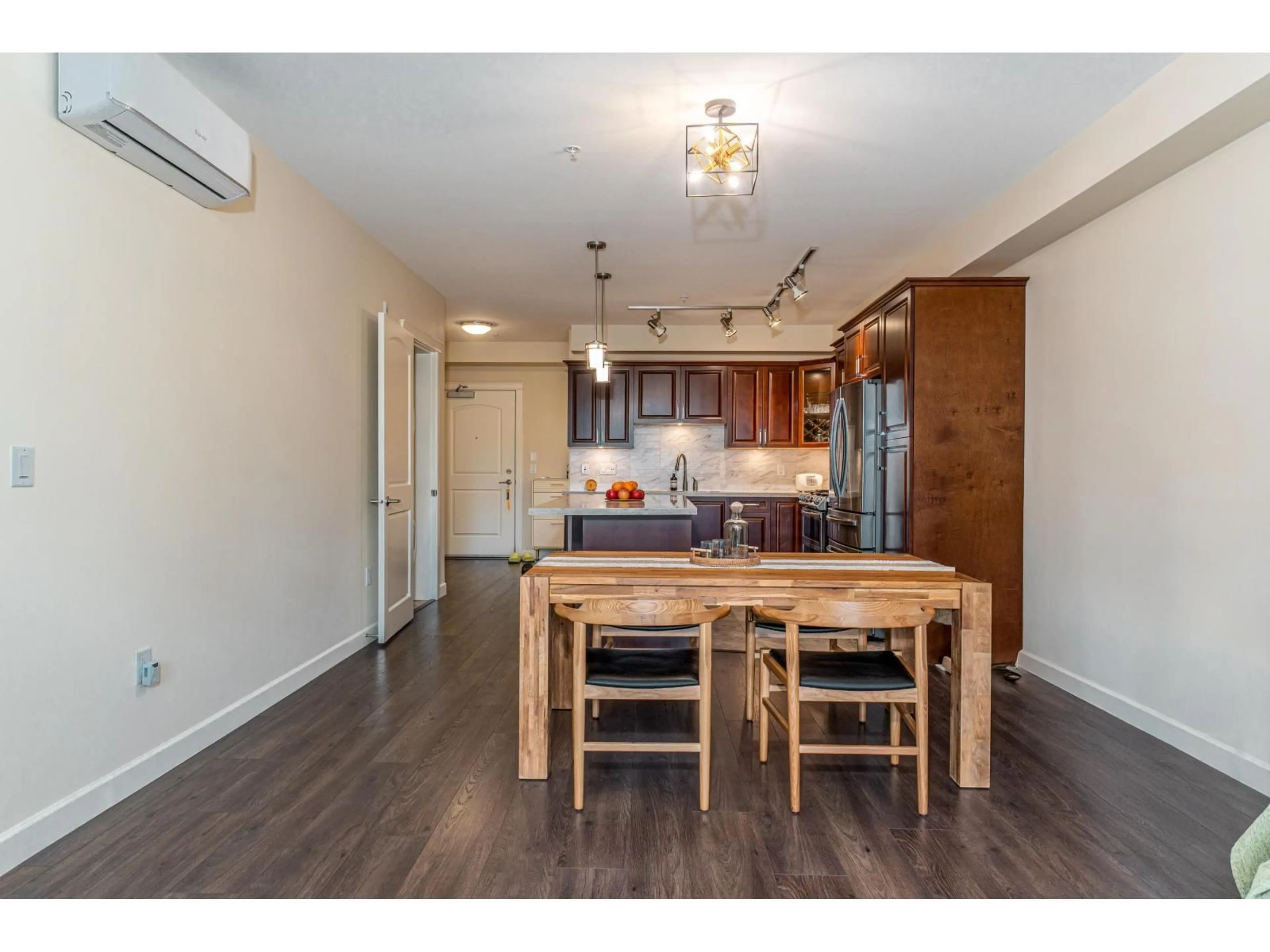 Open concept kitchen, wood/laminate floor for 103 - 14588 MCDOUGALL DRIVE, Surrey British Columbia V4P0H1