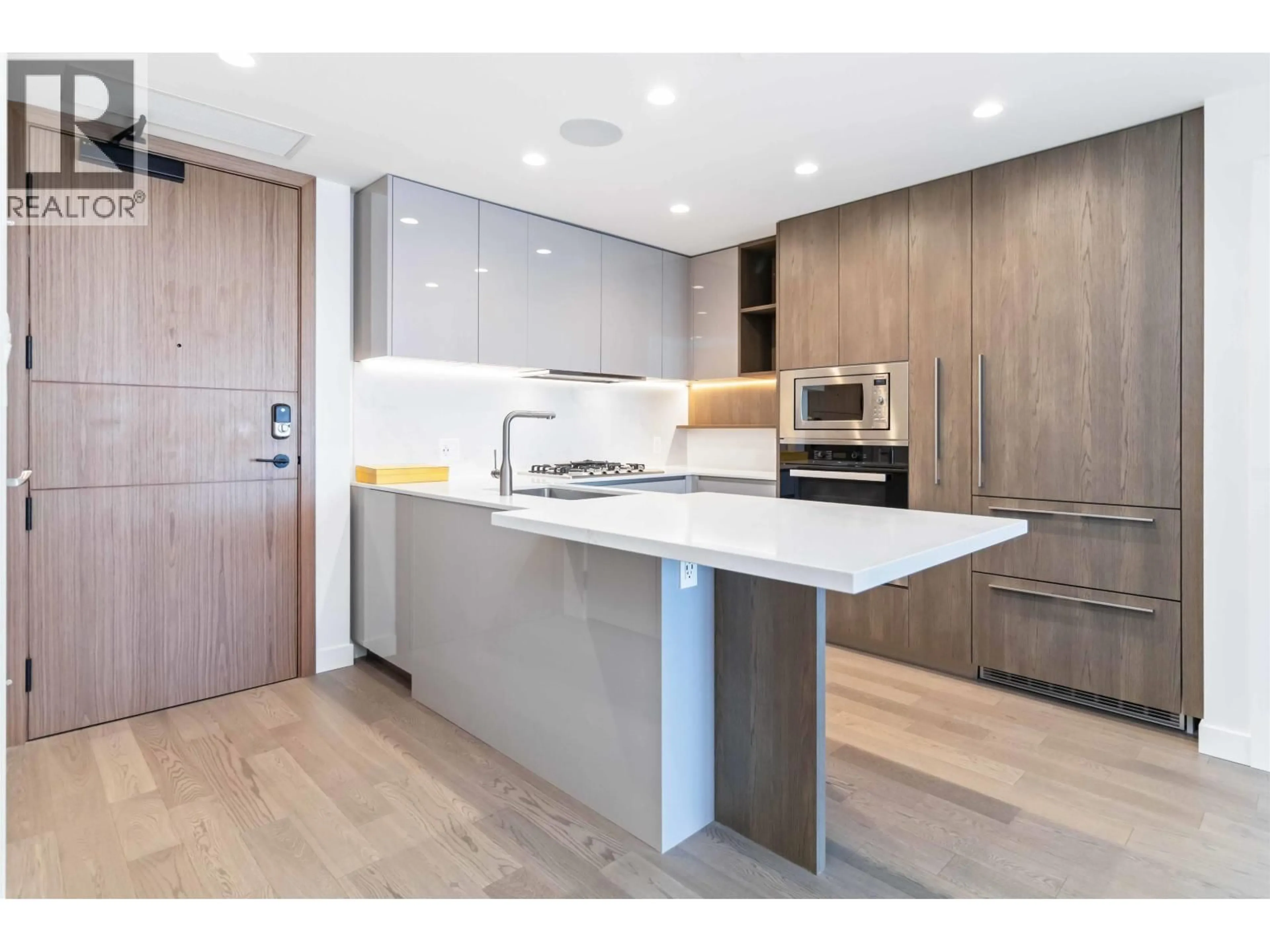 Open concept kitchen, wood/laminate floor for 1103 - 6811 PEARSON WAY, Richmond British Columbia V7C0E7