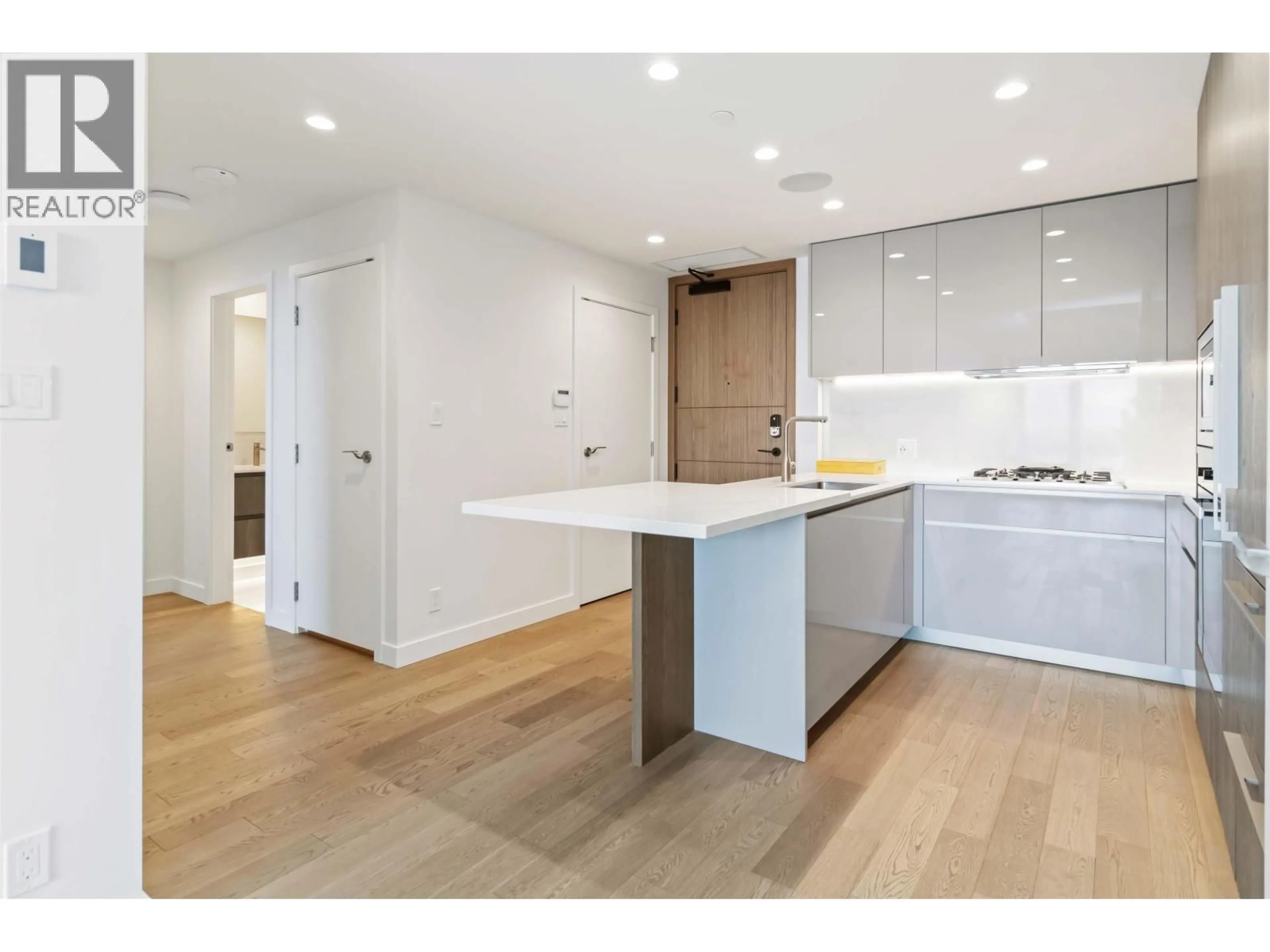 Open concept kitchen, wood/laminate floor for 1103 - 6811 PEARSON WAY, Richmond British Columbia V7C0E7