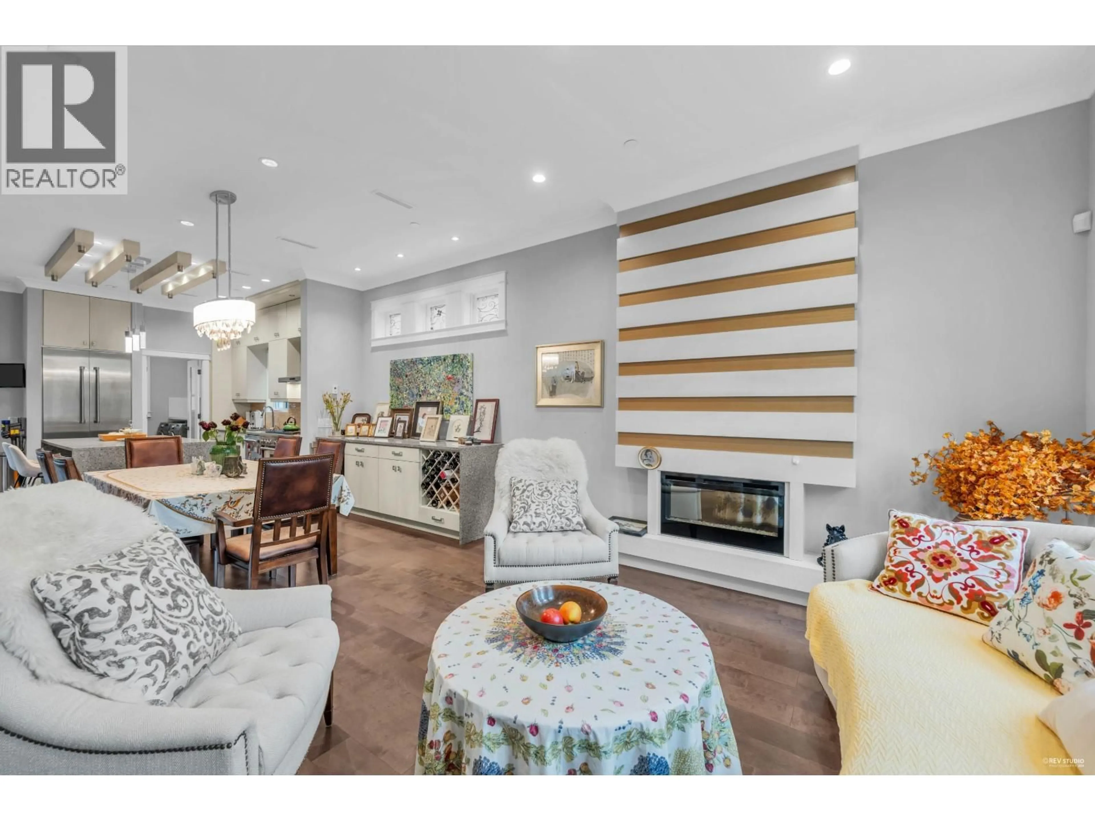 Living room with furniture, wood/laminate floor for 4217 16TH AVENUE, Vancouver British Columbia V6R3E5