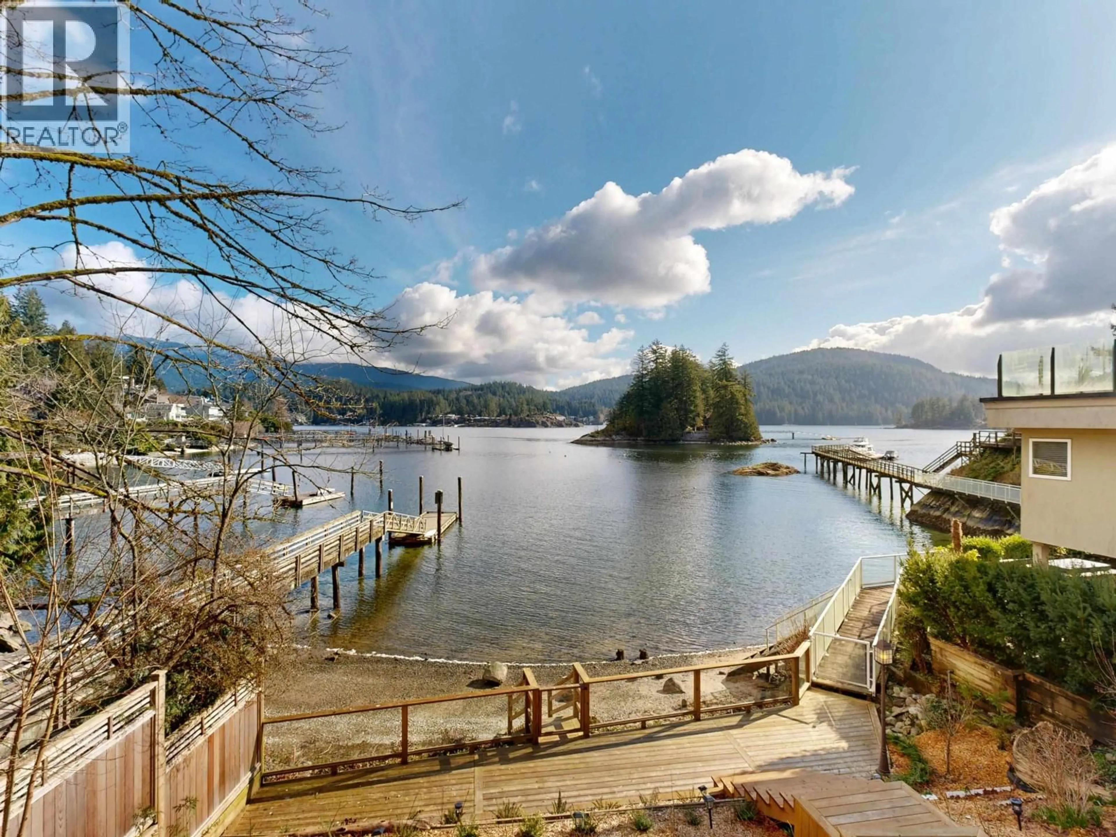 A pic from outside/outdoor area/front of a property/back of a property/a pic from drone, water/lake/river/ocean view for 4545 STRATHCONA ROAD, North Vancouver British Columbia V7G1G7