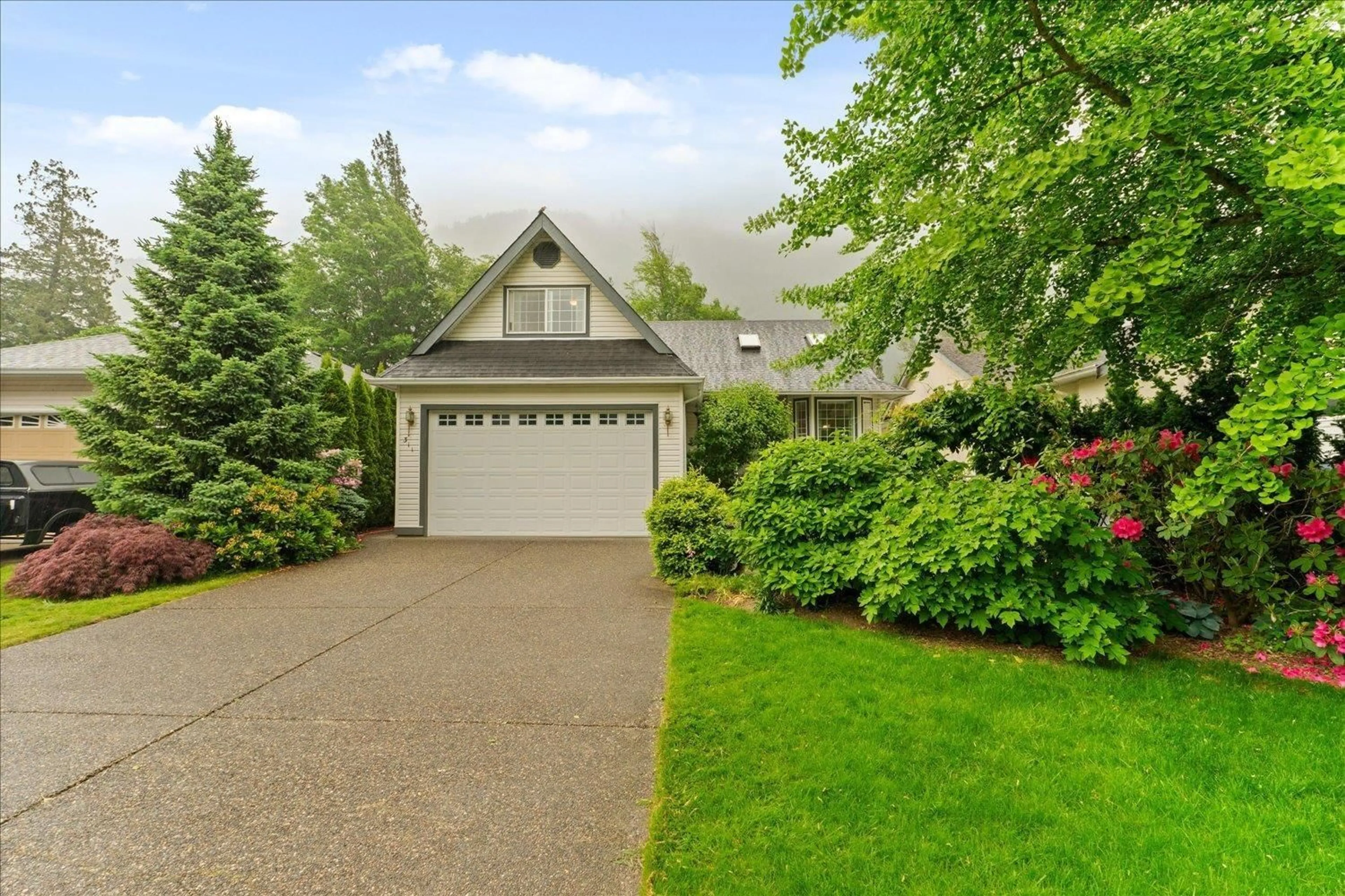 Home with vinyl exterior material, street for 311 MIAMI RIVER DRIVE, Harrison Hot Springs British Columbia V0M1K0