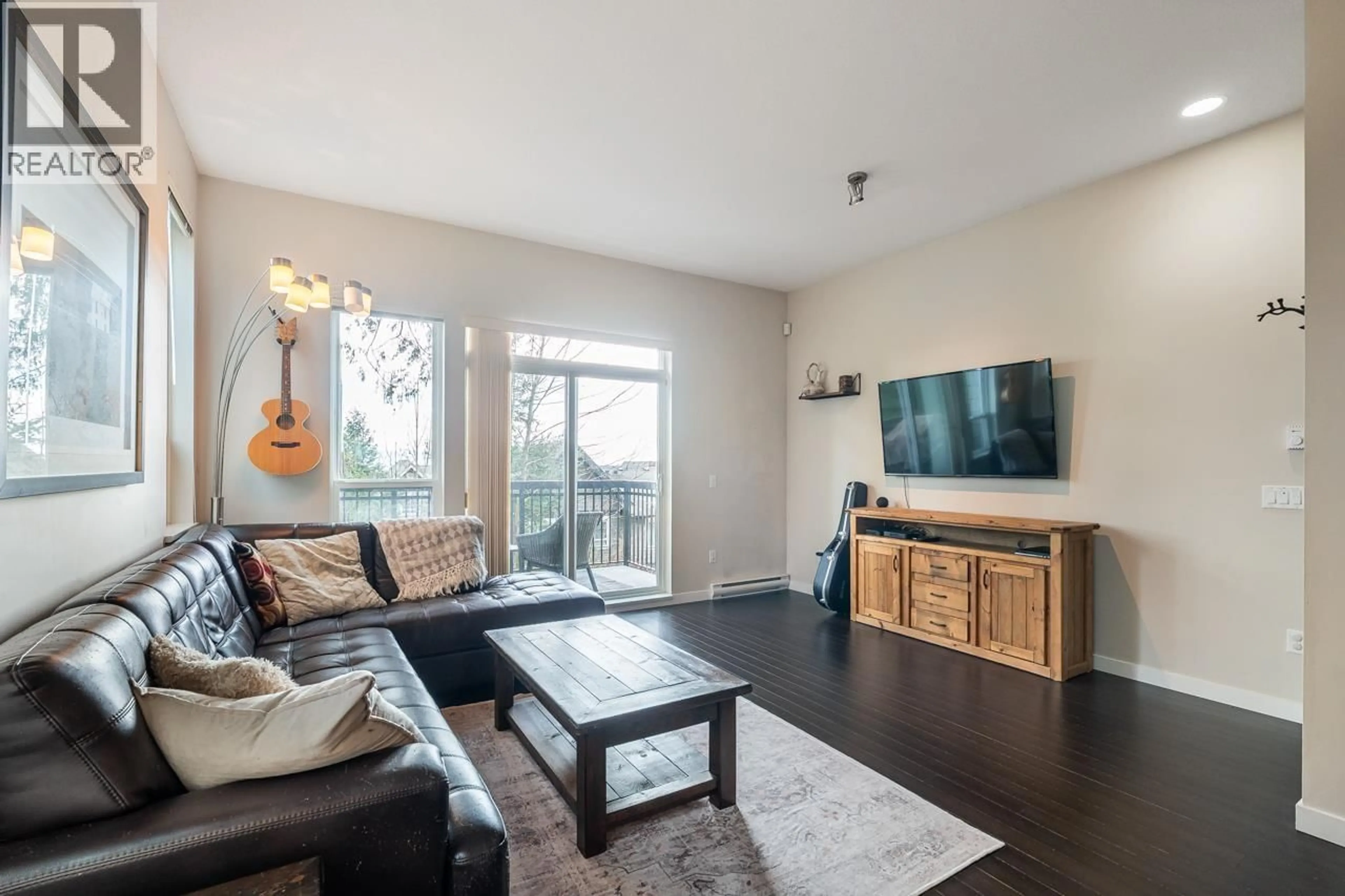 Living room with furniture, wood/laminate floor for 22 - 1305 SOBALL STREET, Coquitlam British Columbia V3E0E8