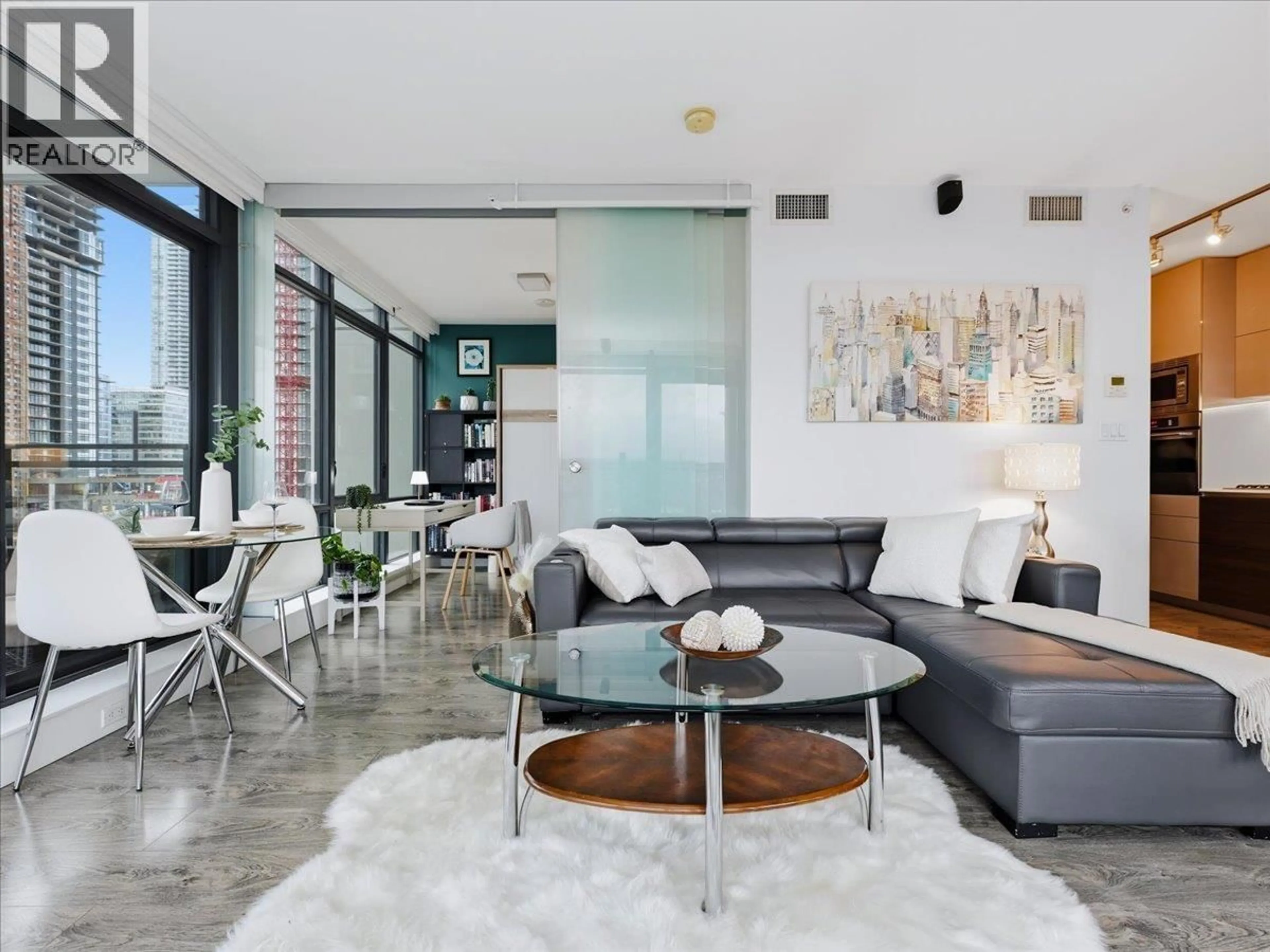 Living room with furniture, cement floor for 1106 - 2378 ALPHA AVENUE, Burnaby British Columbia V5C0K2