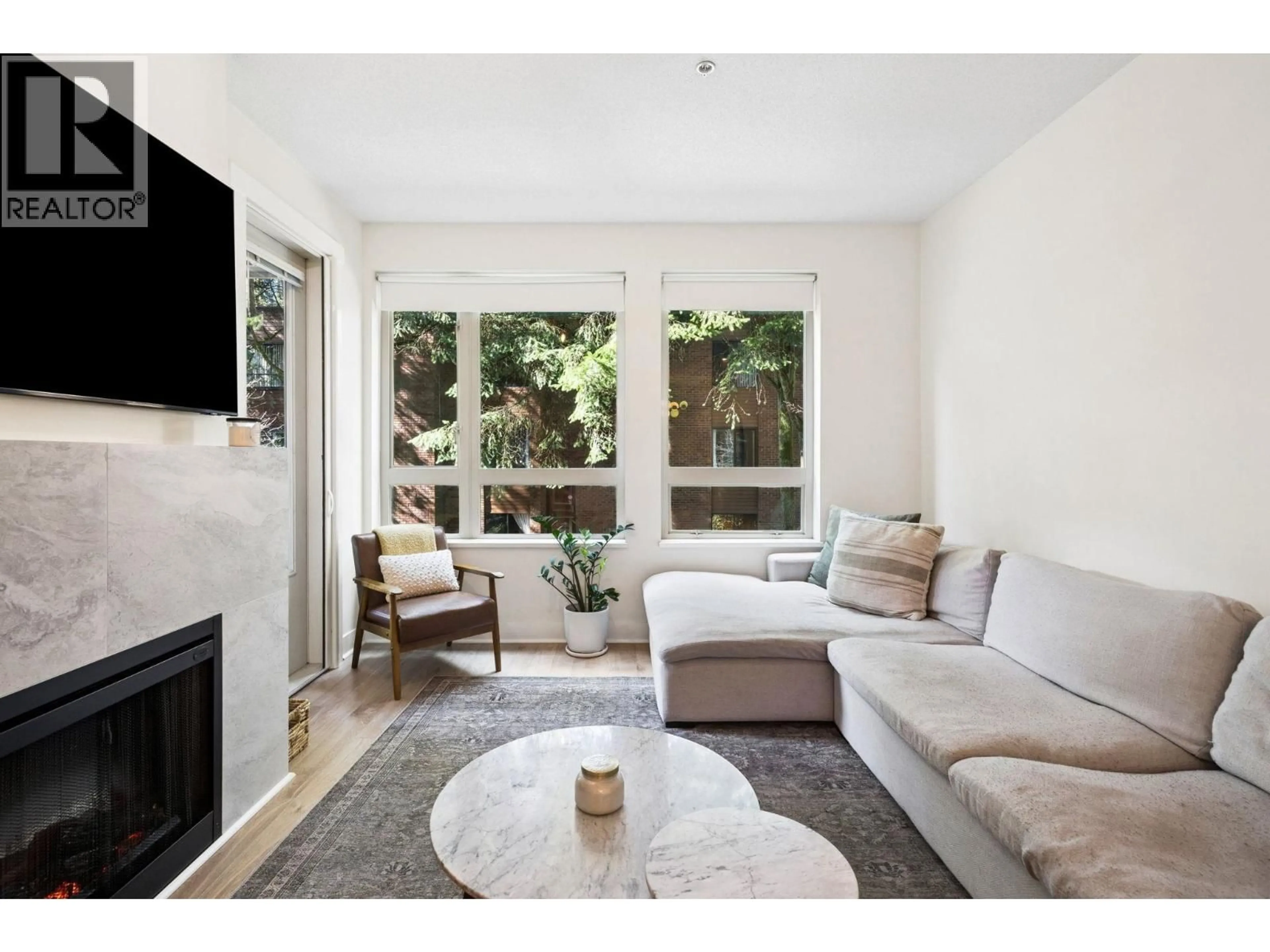 Living room with furniture, unknown for 218 - 1111 27TH STREET, North Vancouver British Columbia V7J1S3