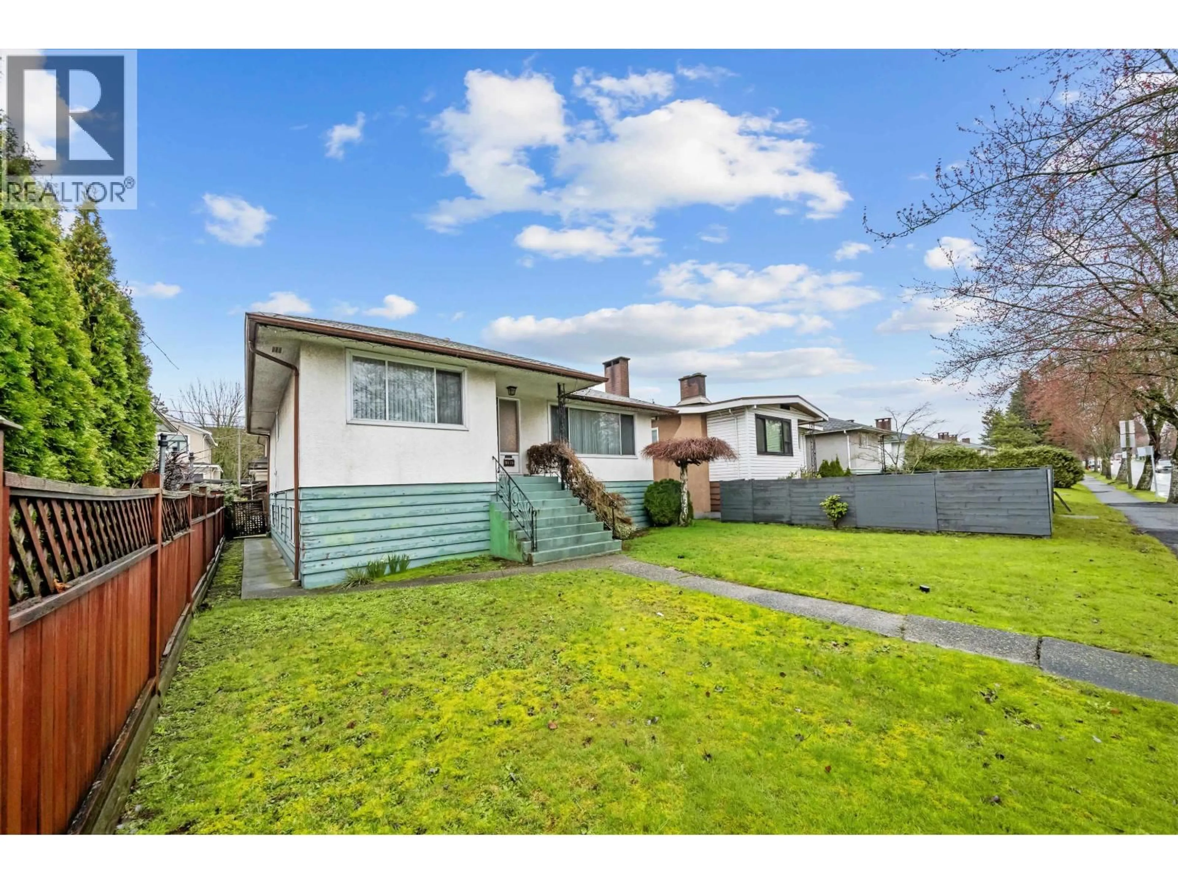 A pic from outside/outdoor area/front of a property/back of a property/a pic from drone, street for 3115 49 AVENUE, Vancouver British Columbia V5S1L2