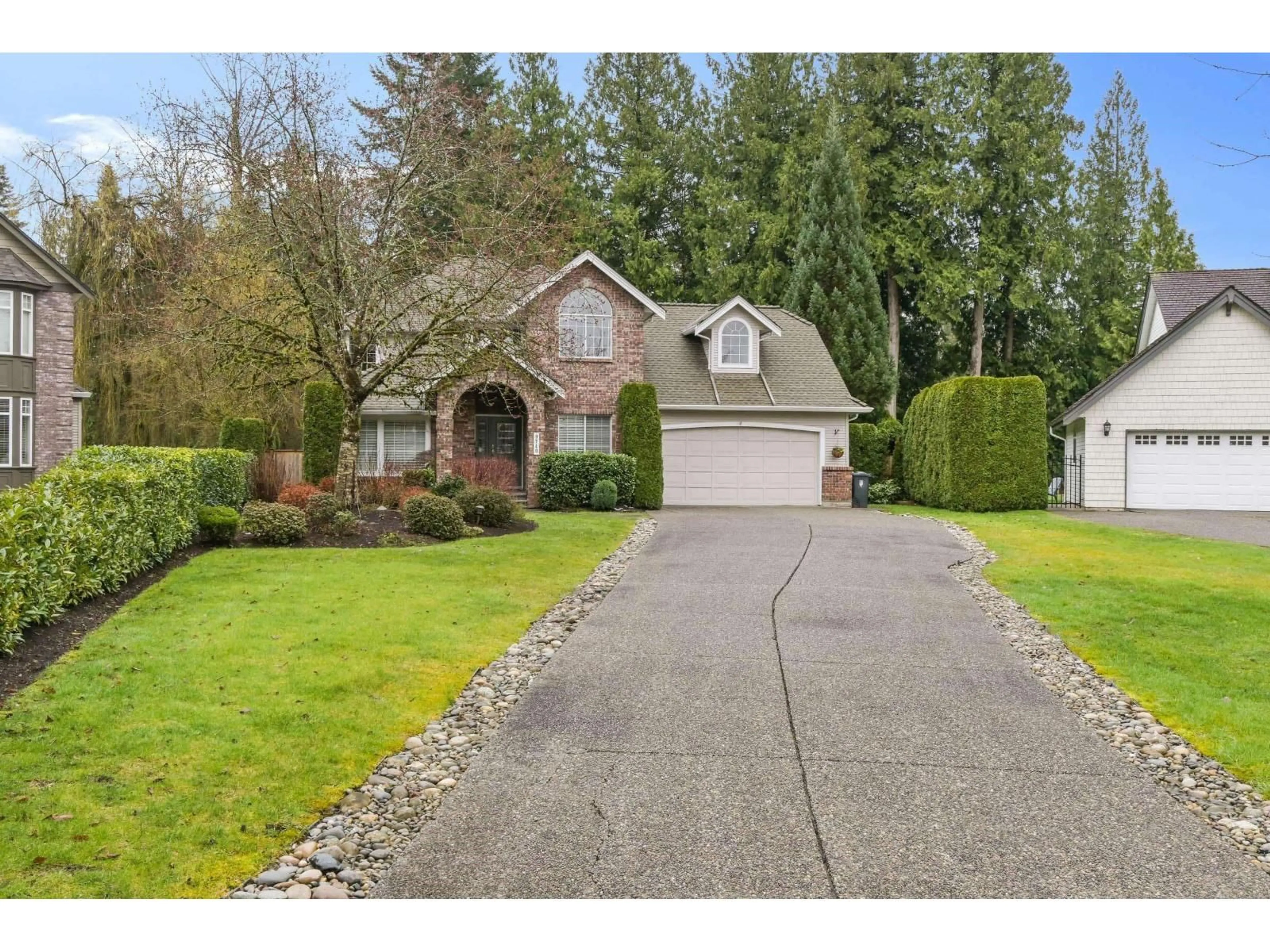 Home with vinyl exterior material, street for 9740 210 STREET, Langley British Columbia V1M2P8