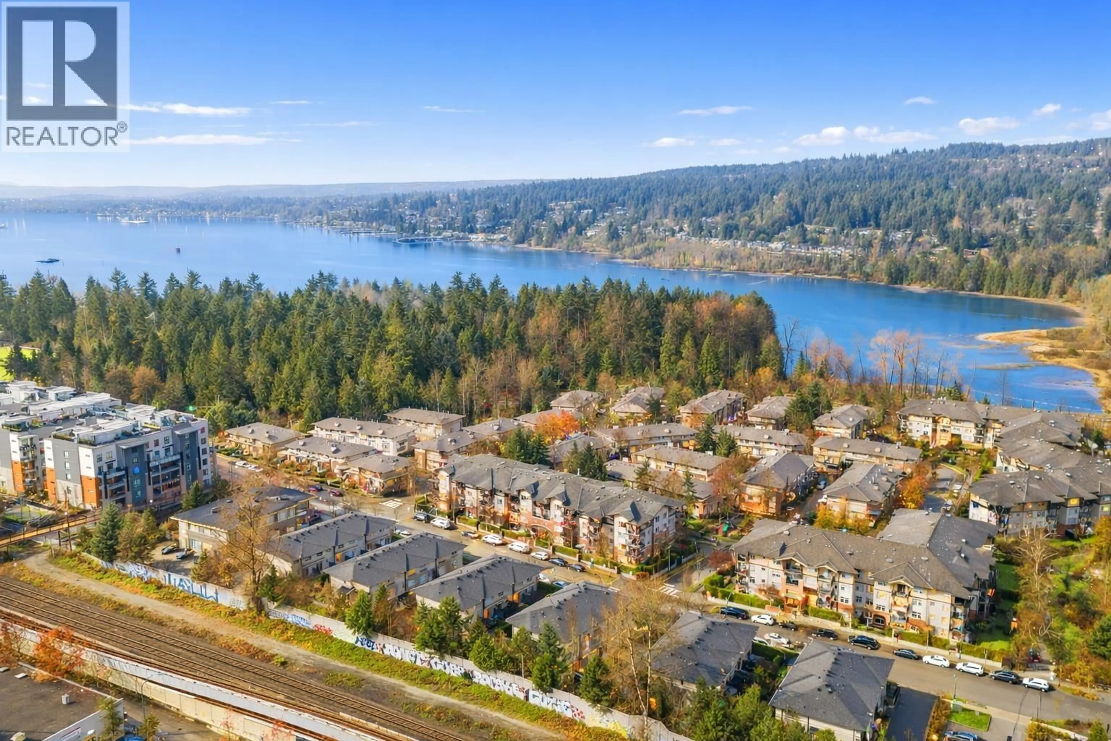 A pic from outside/outdoor area/front of a property/back of a property/a pic from drone, water/lake/river/ocean view for 208 - 200 KLAHANIE DRIVE, Port Moody British Columbia V3H5K7