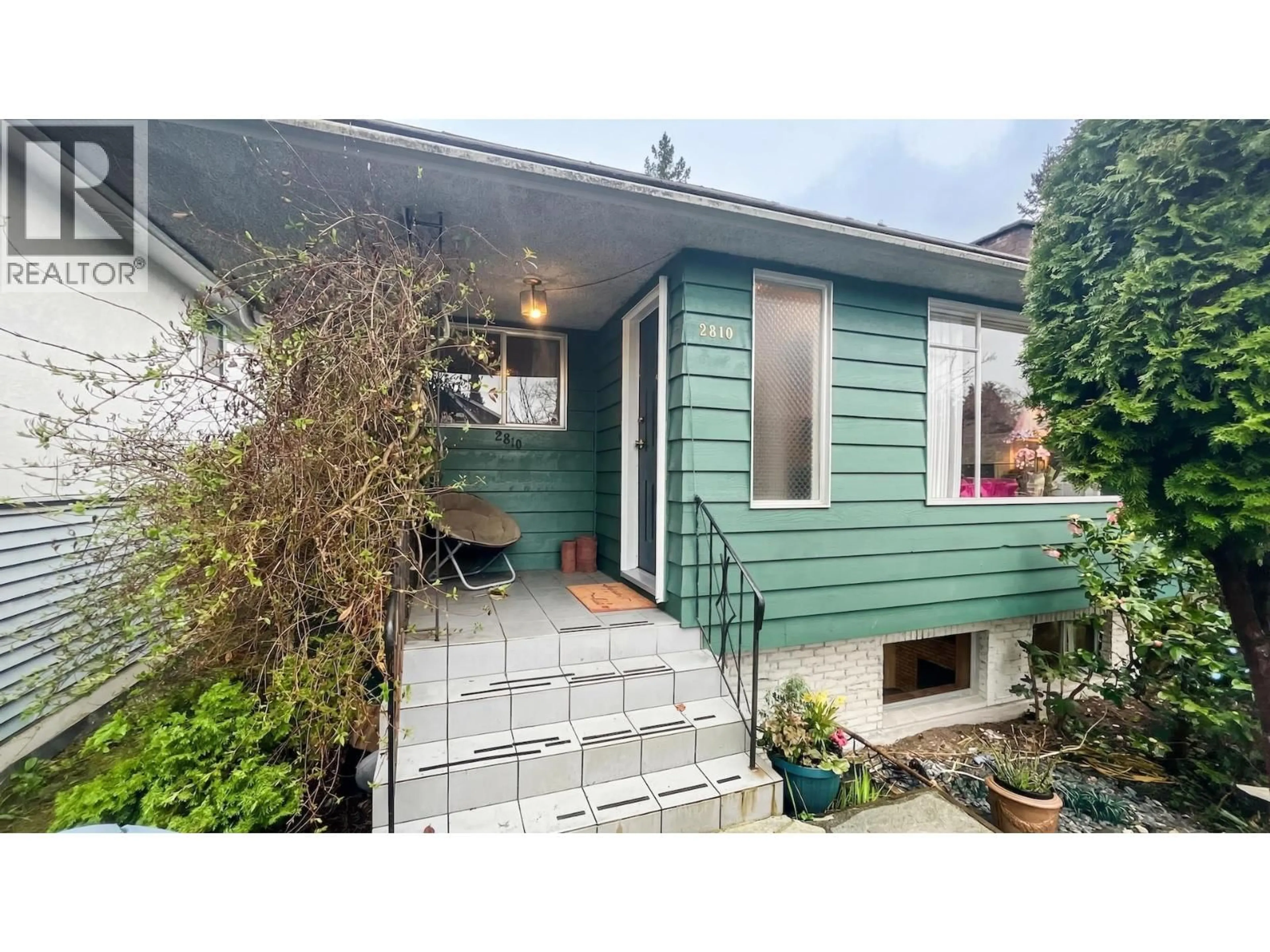 Home with vinyl exterior material, street for 2810 31ST AVENUE, Vancouver British Columbia V6L2A2