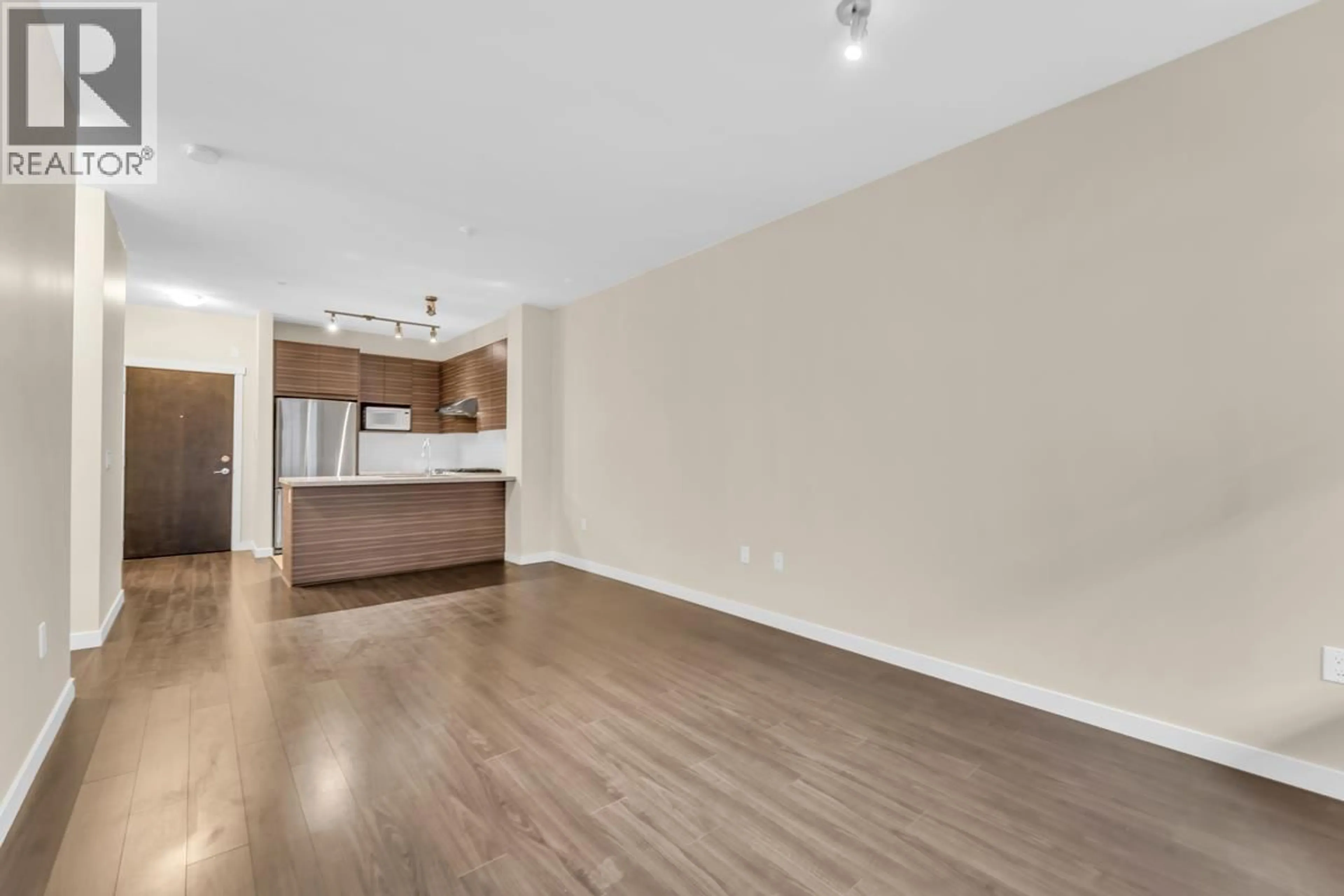 Open concept kitchen, wood/laminate floor for 233 - 9399 ODLIN ROAD, Richmond British Columbia V6X0J6