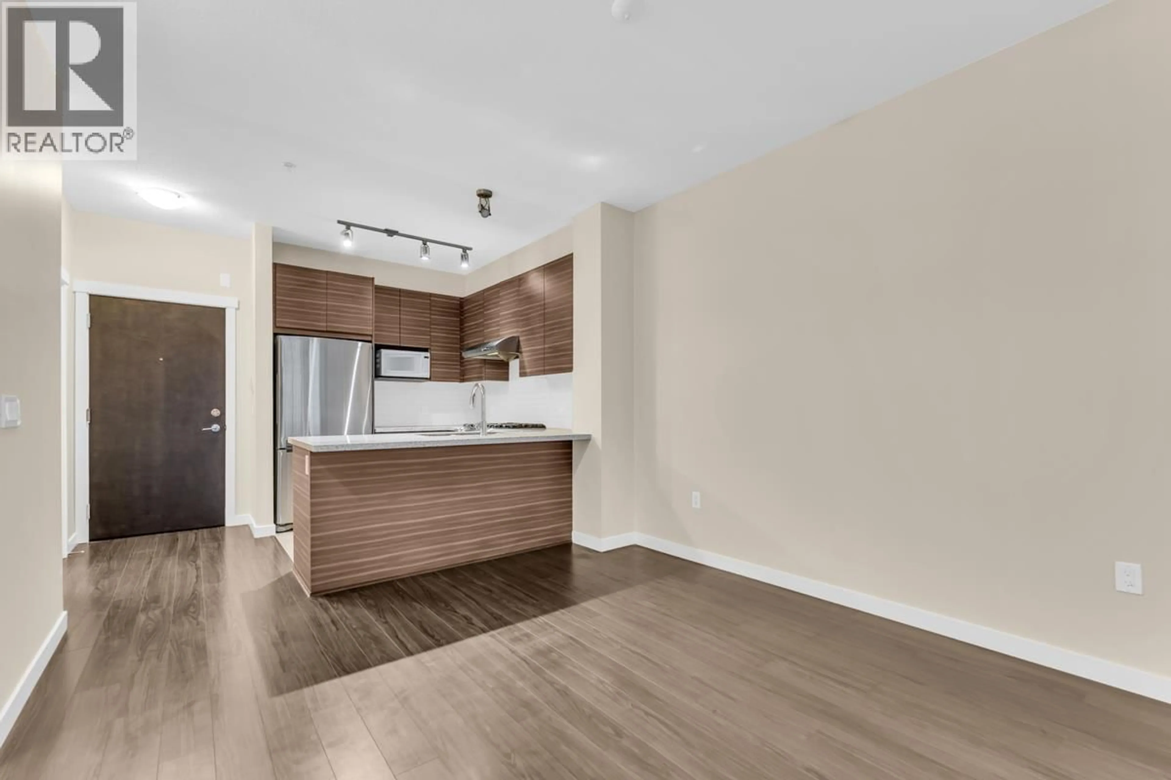Open concept kitchen, wood/laminate floor for 233 - 9399 ODLIN ROAD, Richmond British Columbia V6X0J6