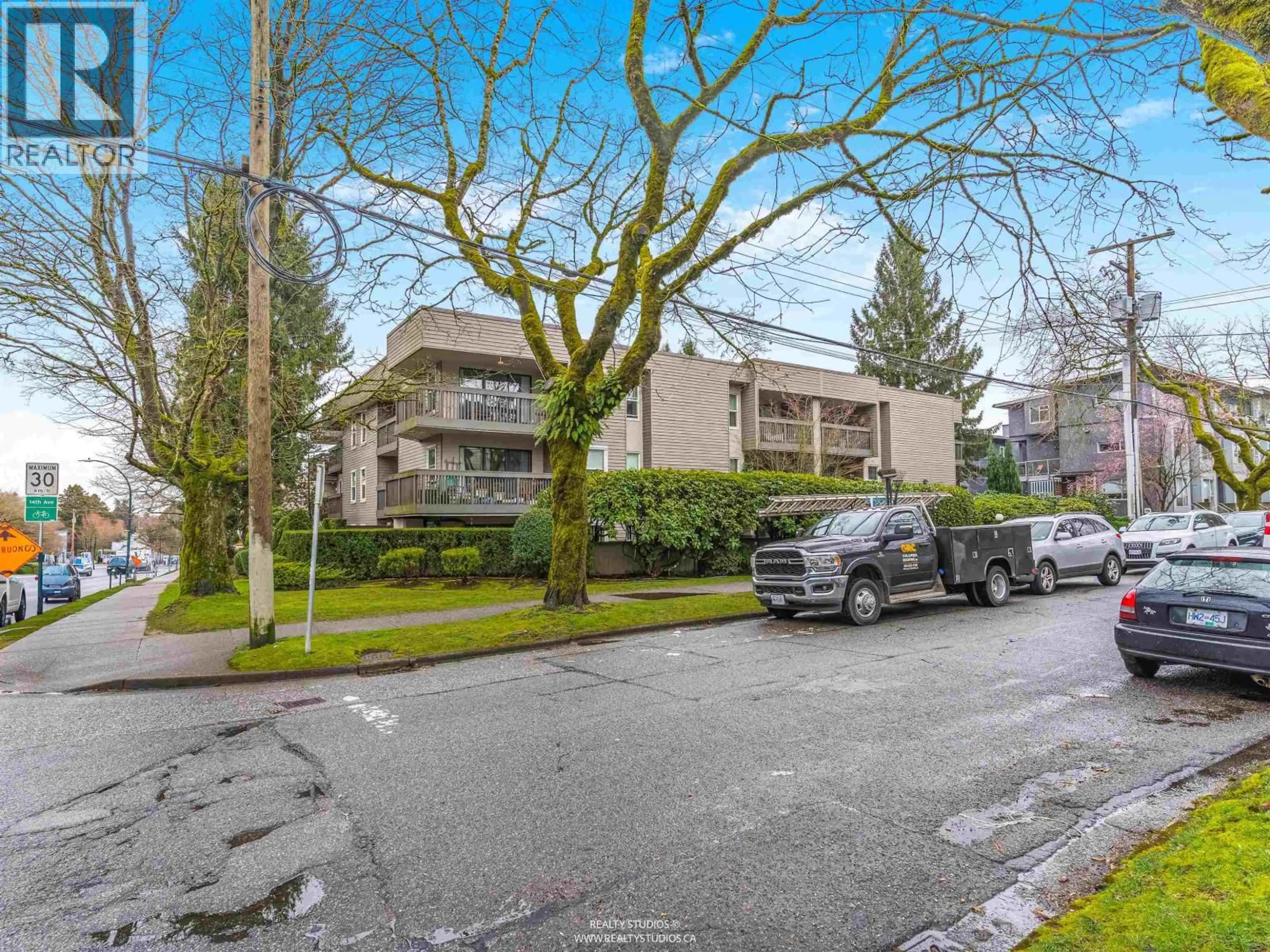 A pic from outside/outdoor area/front of a property/back of a property/a pic from drone, street for 204 - 3020 QUEBEC STREET, Vancouver British Columbia V5T3B1