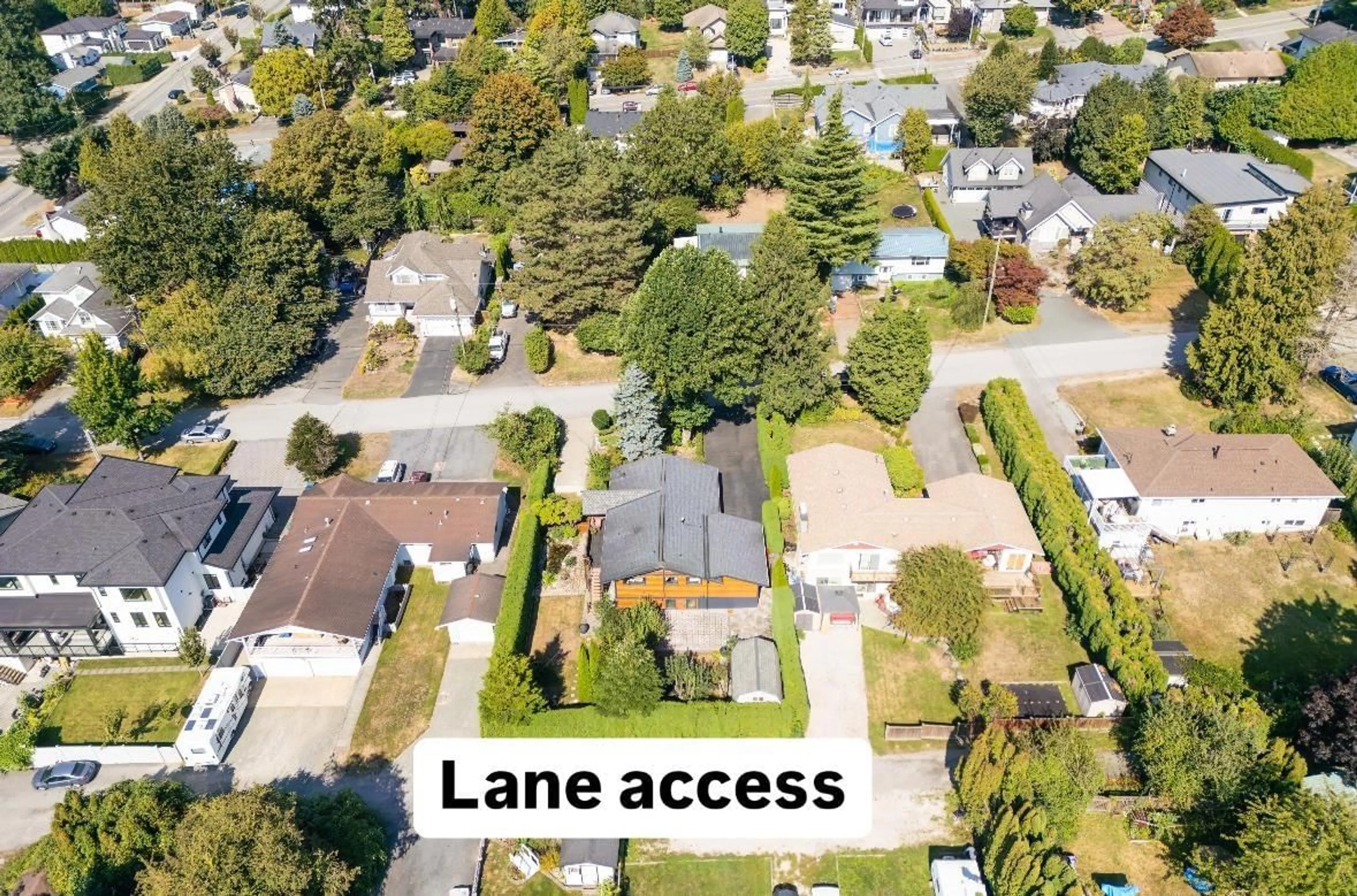 A pic from outside/outdoor area/front of a property/back of a property/a pic from drone, street for 18058 57A AVENUE, Surrey British Columbia V3S1J6