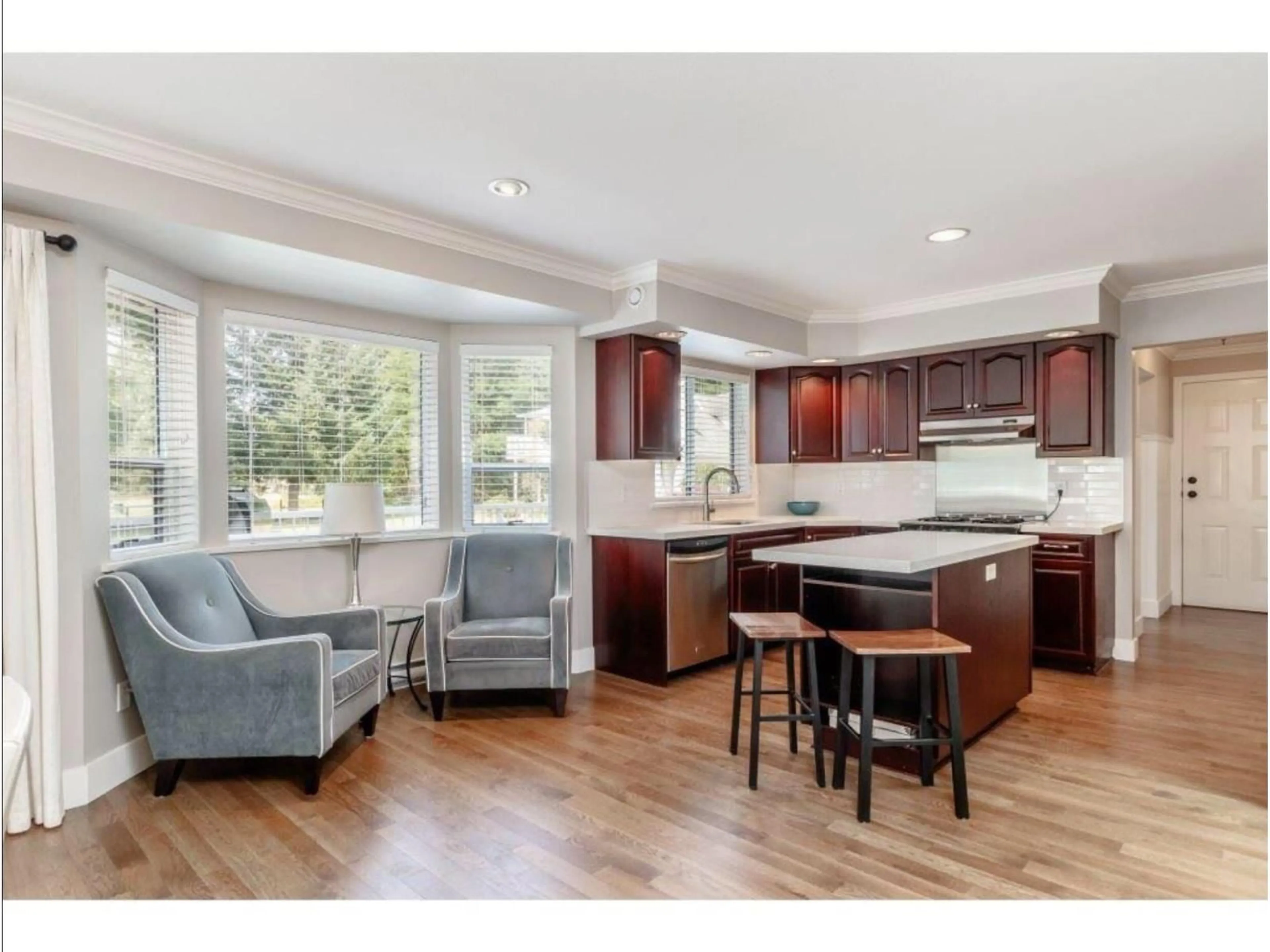 Open concept kitchen, wood/laminate floor for 24903 54 AVENUE, Langley British Columbia V4W1T3