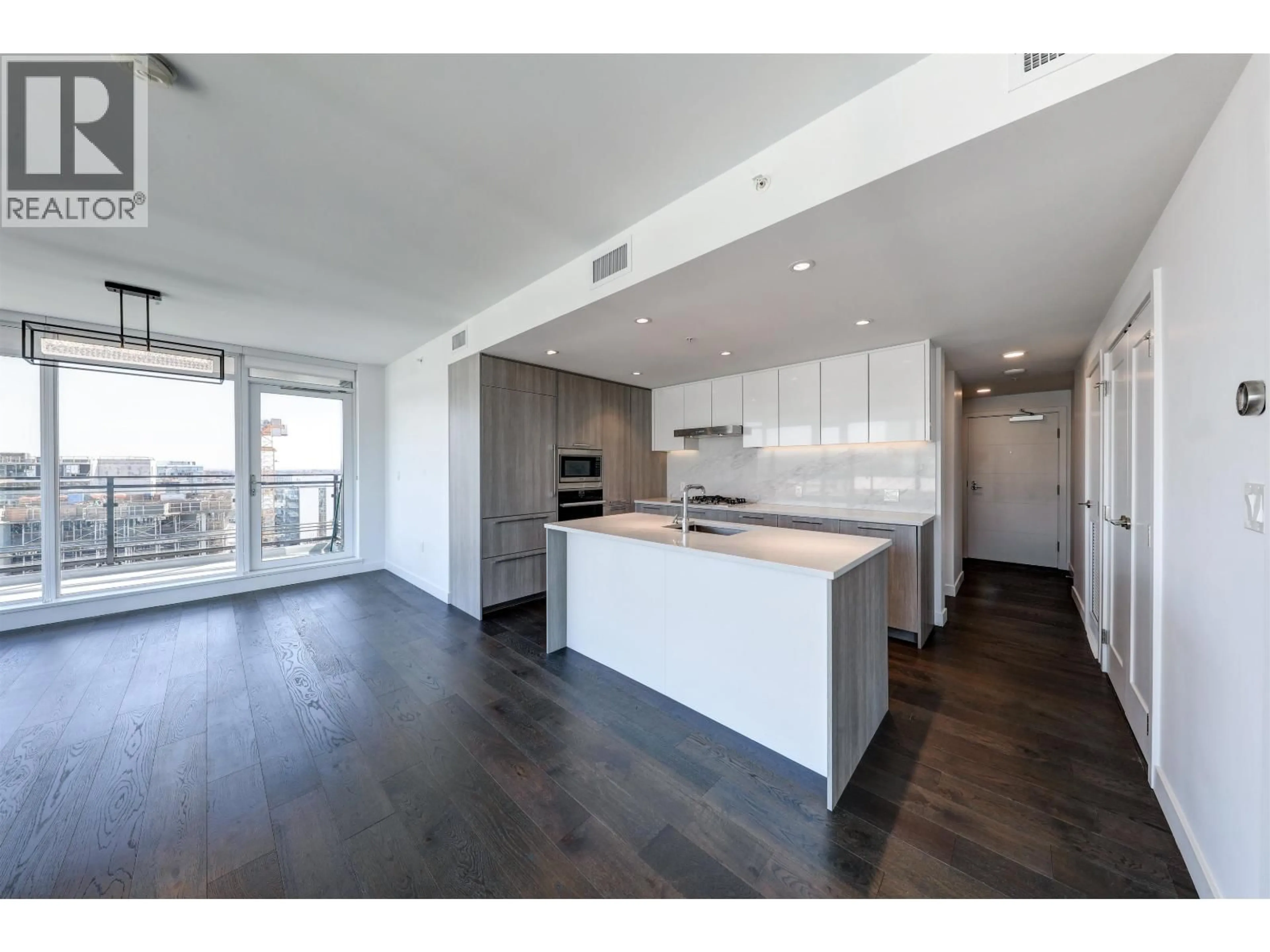 Open concept kitchen, wood/laminate floor for 1306 - 8199 CAPSTAN WAY, Richmond British Columbia V6X0V1