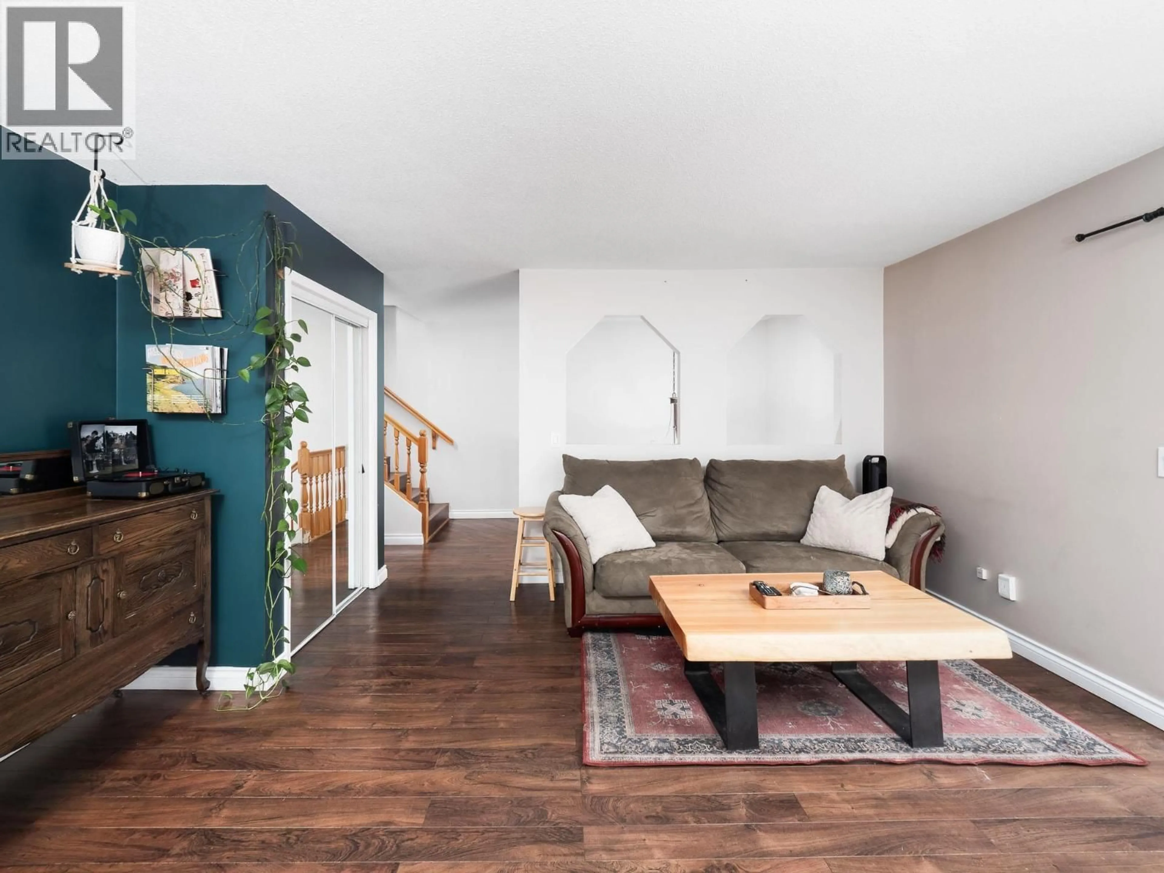 Living room with furniture, wood/laminate floor for 103 - 3015 ST ANNE CRESCENT, Prince George British Columbia V2N5C7