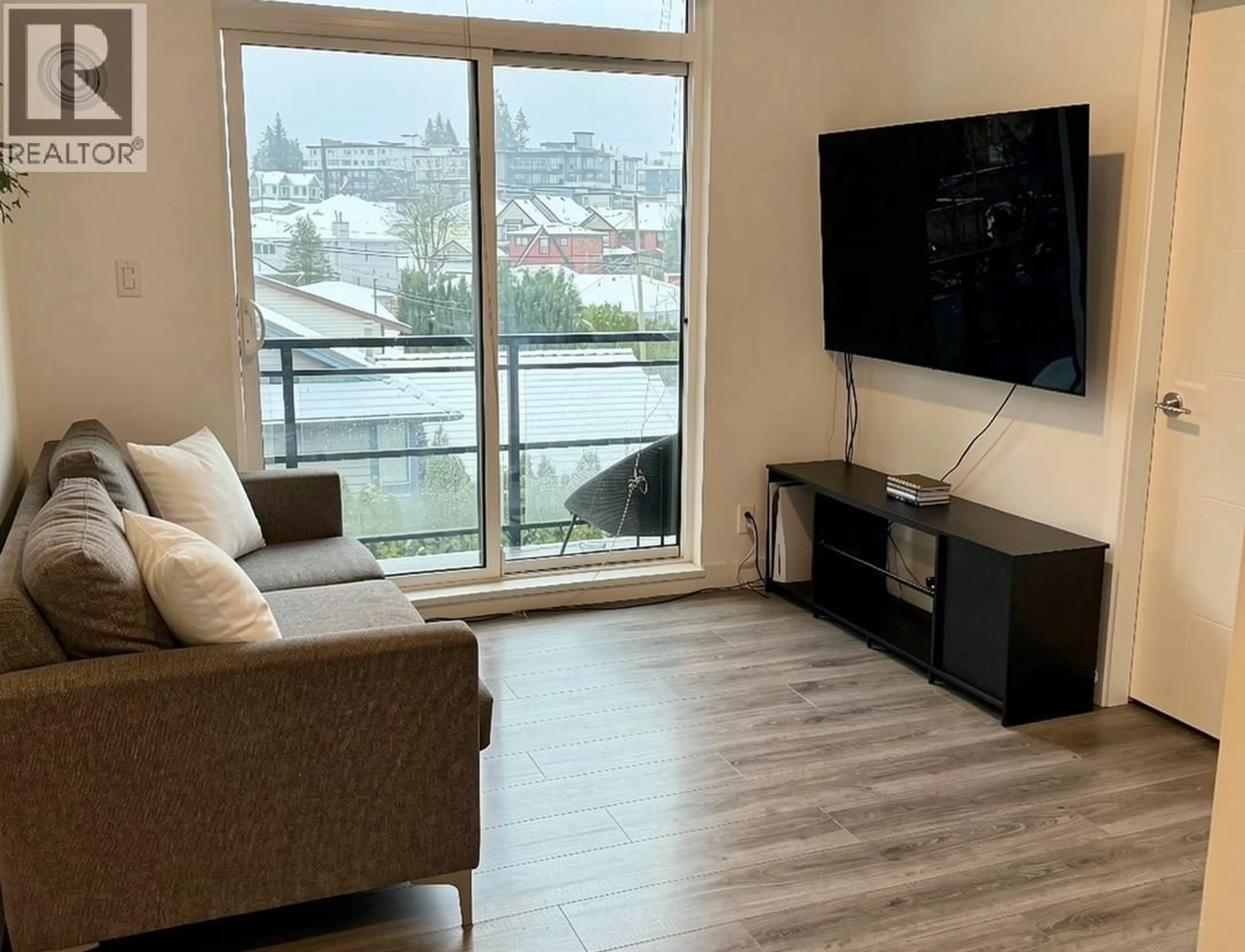 Living room with furniture, unknown for 405 - 700 CLARKE ROAD, Coquitlam British Columbia V3J0K5