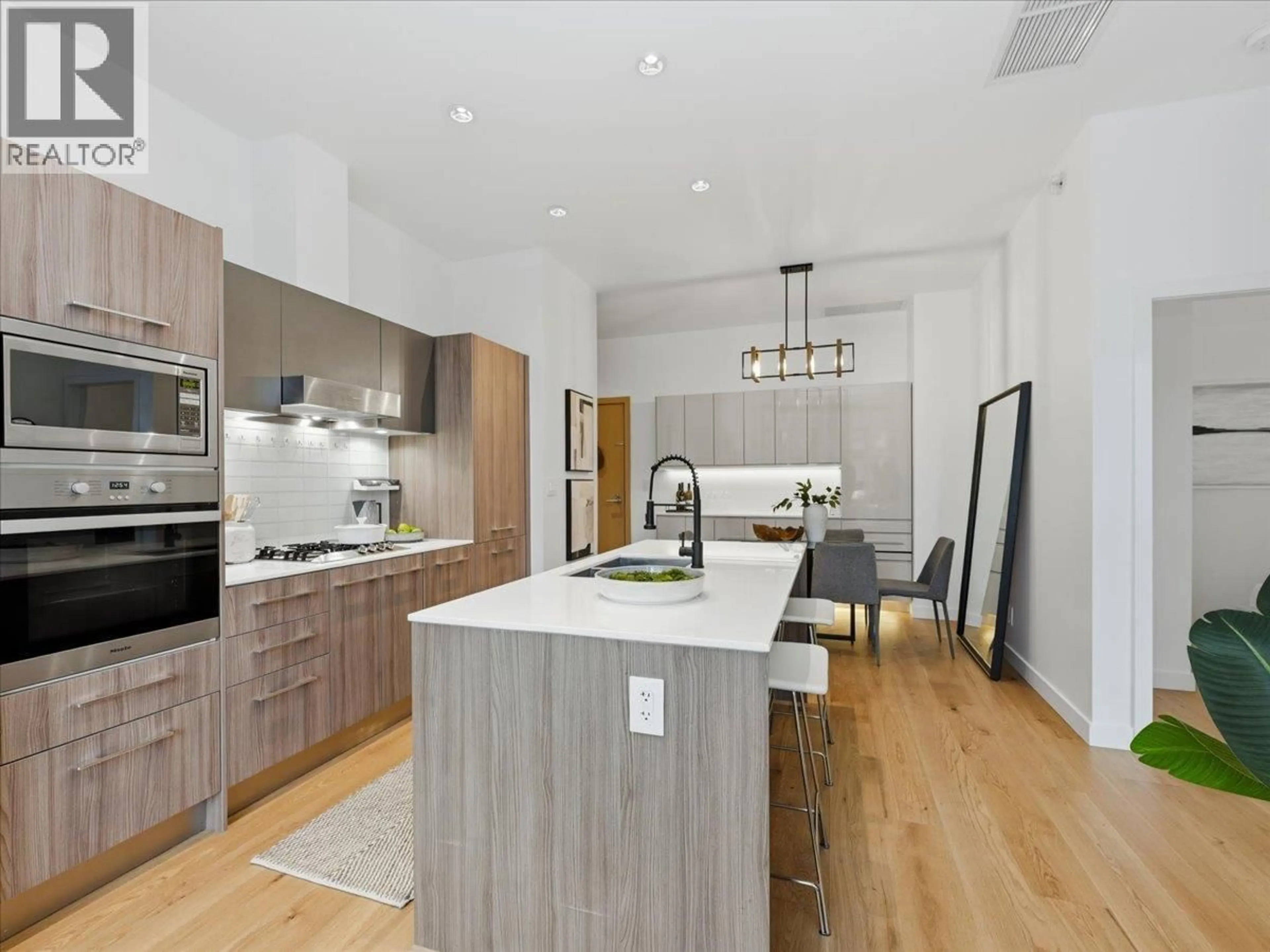 Open concept kitchen, unknown for 107 - 2221 30TH AVENUE, Vancouver British Columbia V5N0G6