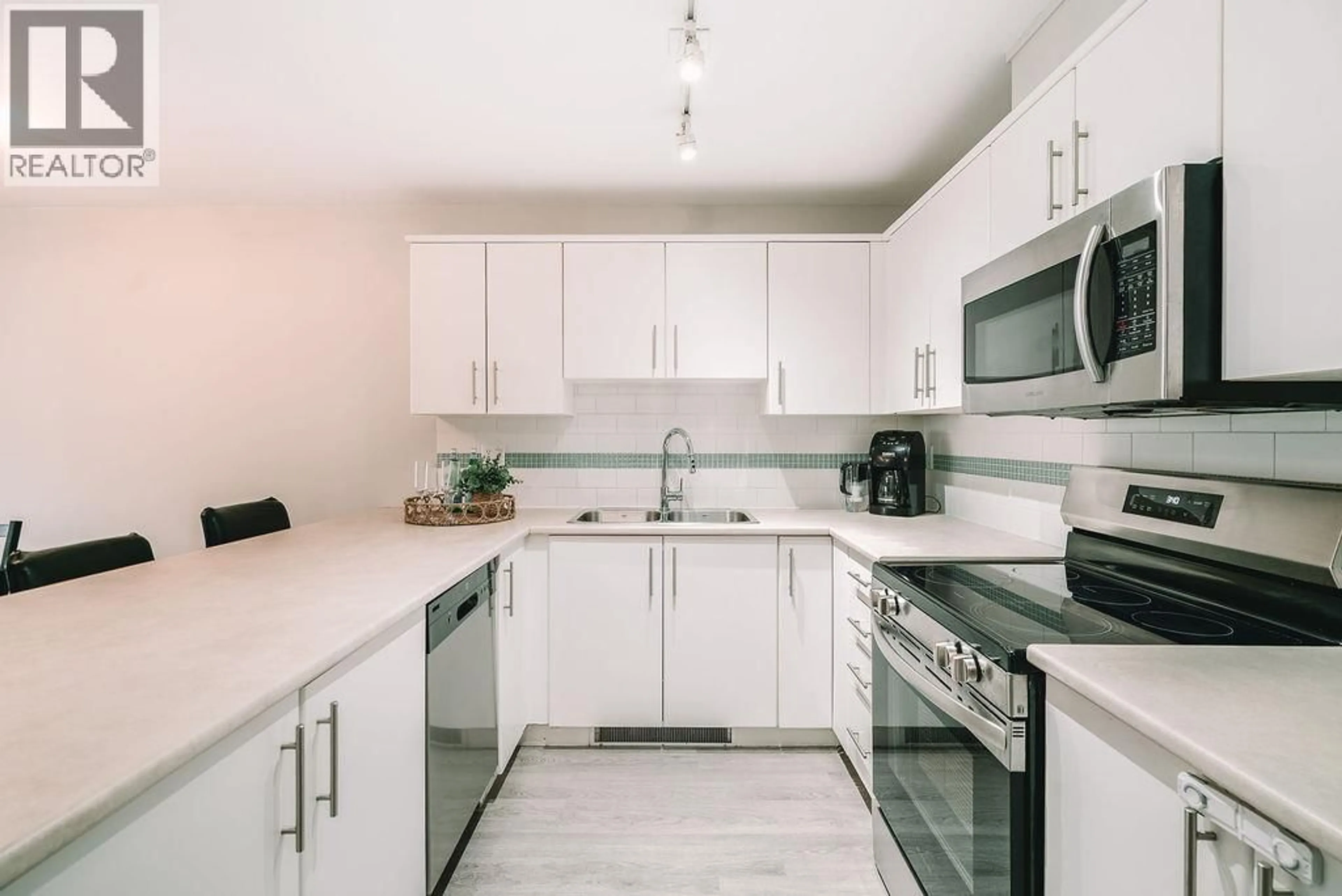 Standard kitchen, ceramic/tile floor for 413 - 12238 224 STREET, Maple Ridge British Columbia V2X8W5