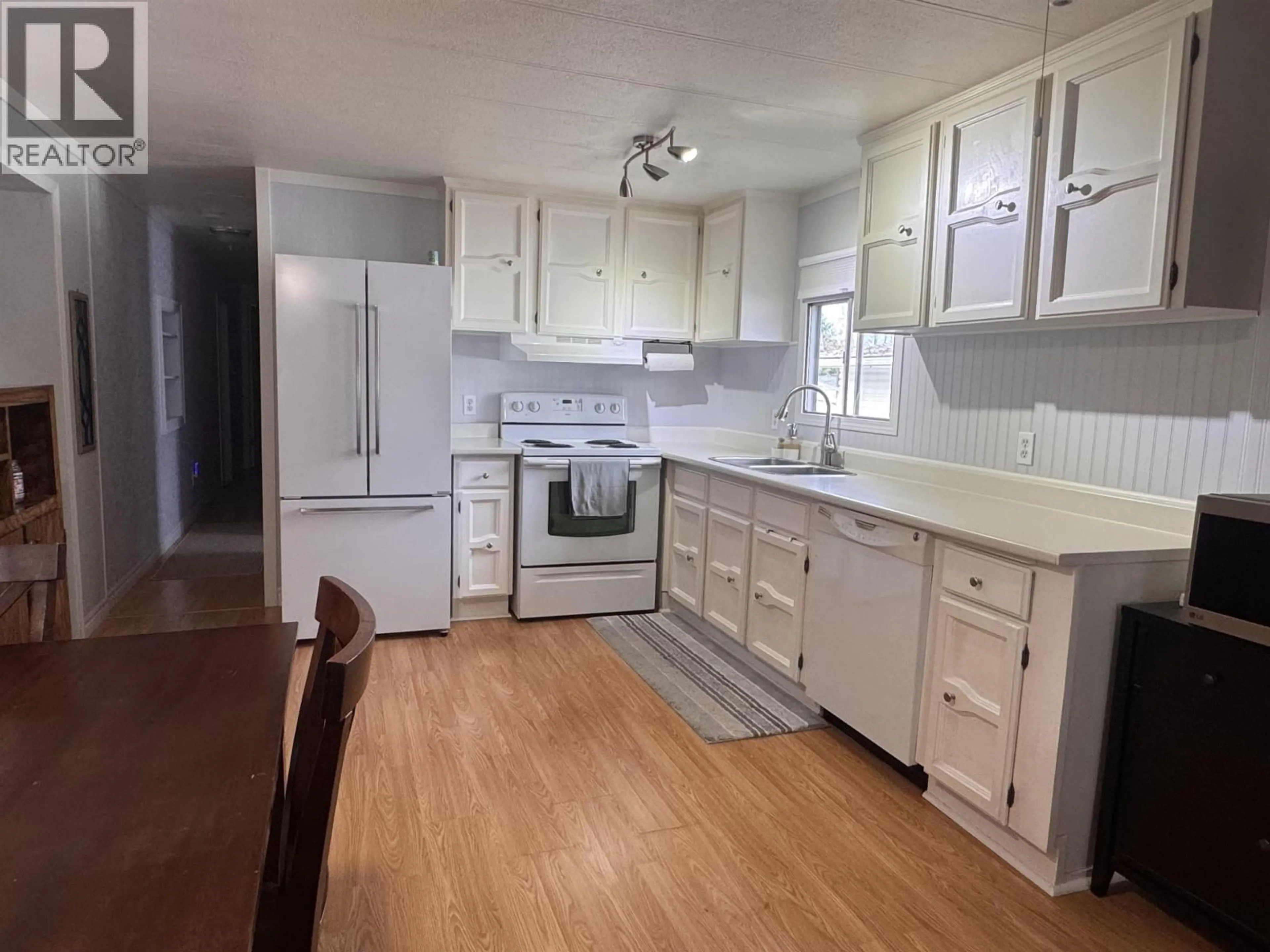 Standard kitchen, wood/laminate floor for 1 - 3889 MULLER AVENUE, Thornhill British Columbia V8G4L2
