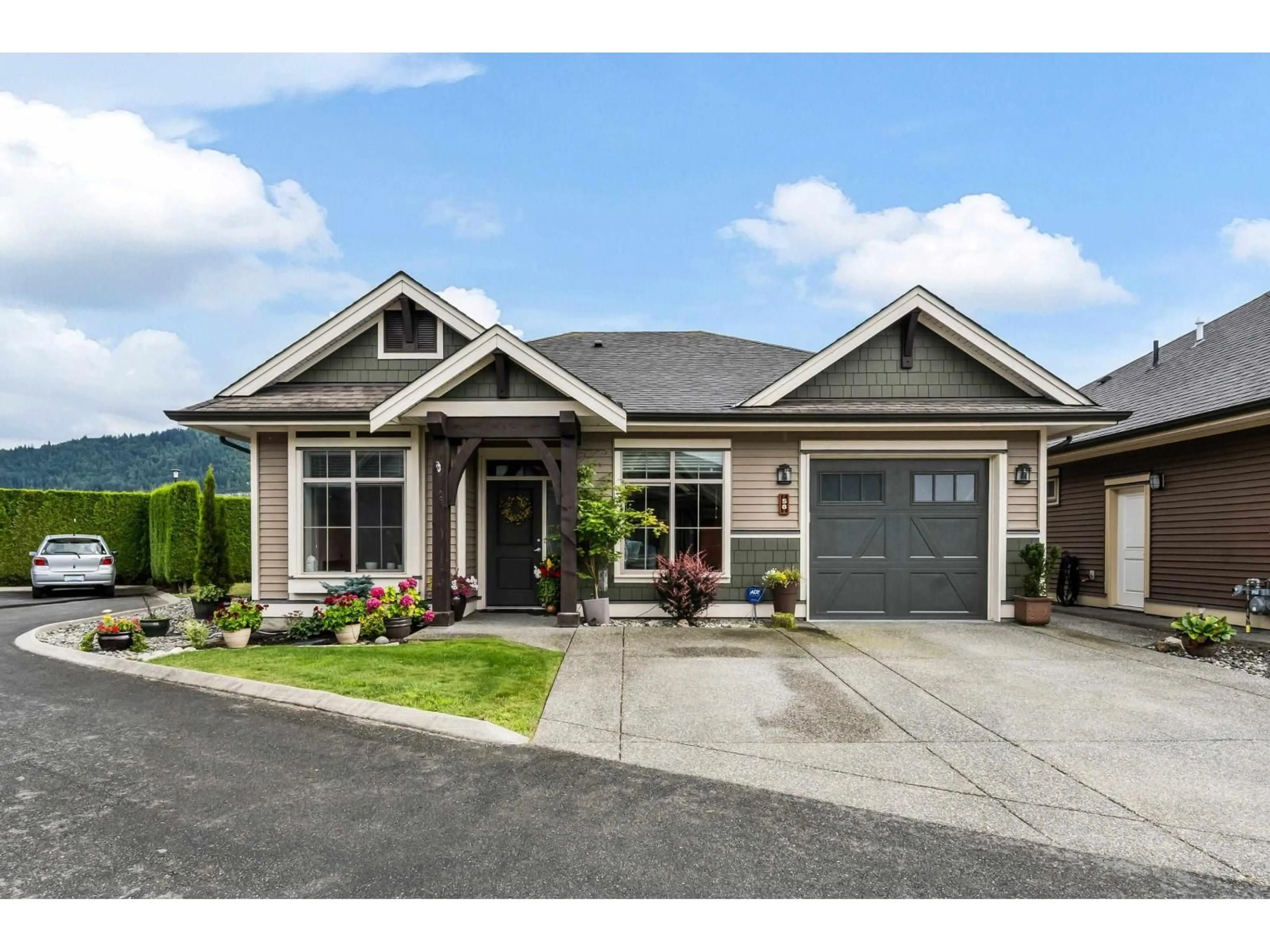 Home with vinyl exterior material, street for 58 - 45900 SOUTH SUMAS ROAD, Chilliwack British Columbia V2R0S9