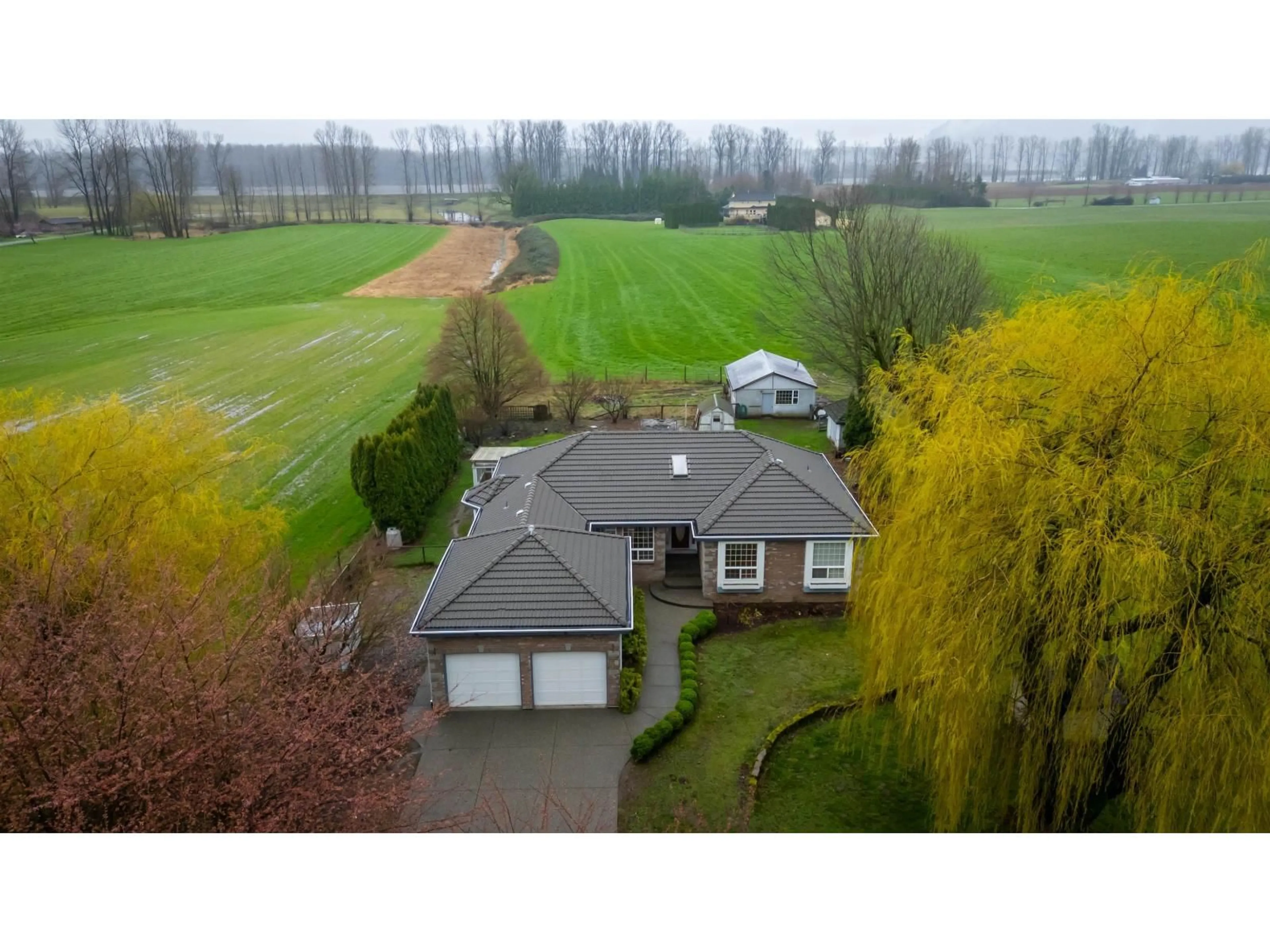A pic from outside/outdoor area/front of a property/back of a property/a pic from drone, street for 41312 NICOMEN ISLAND TRUNK ROAD, Mission British Columbia V0M1G0
