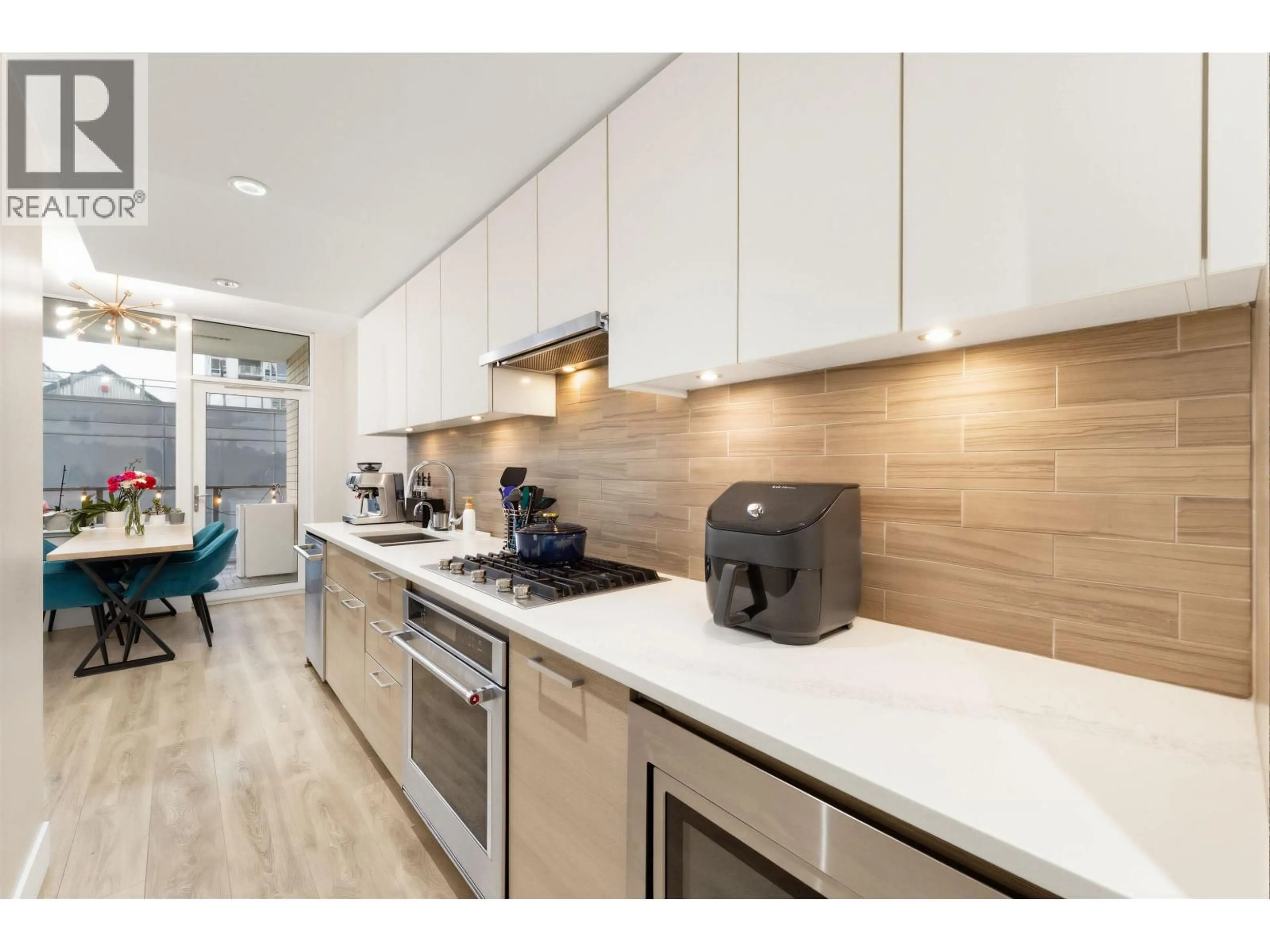 Open concept kitchen, unknown for 613 - 3451 SAWMILL CRESCENT, Vancouver British Columbia V5S0H3