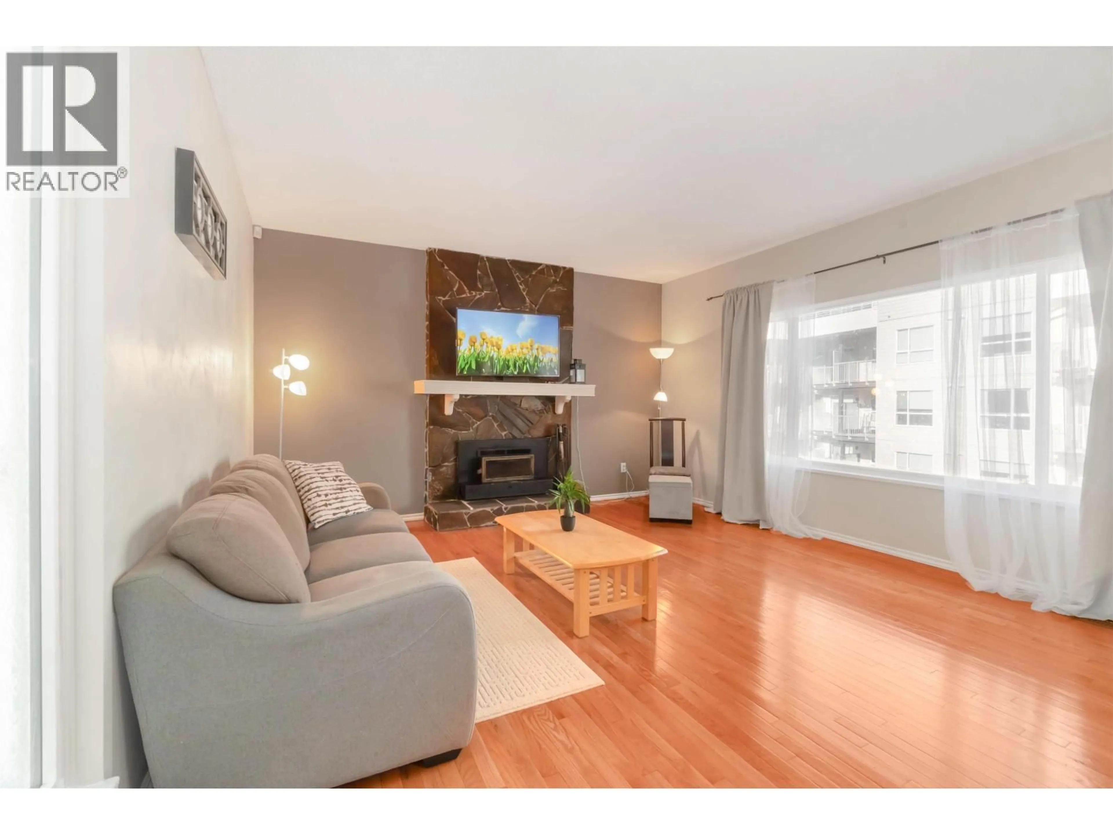 Living room with furniture, wood/laminate floor for 171 EDWARD CRESCENT, Port Moody British Columbia V3H3J8