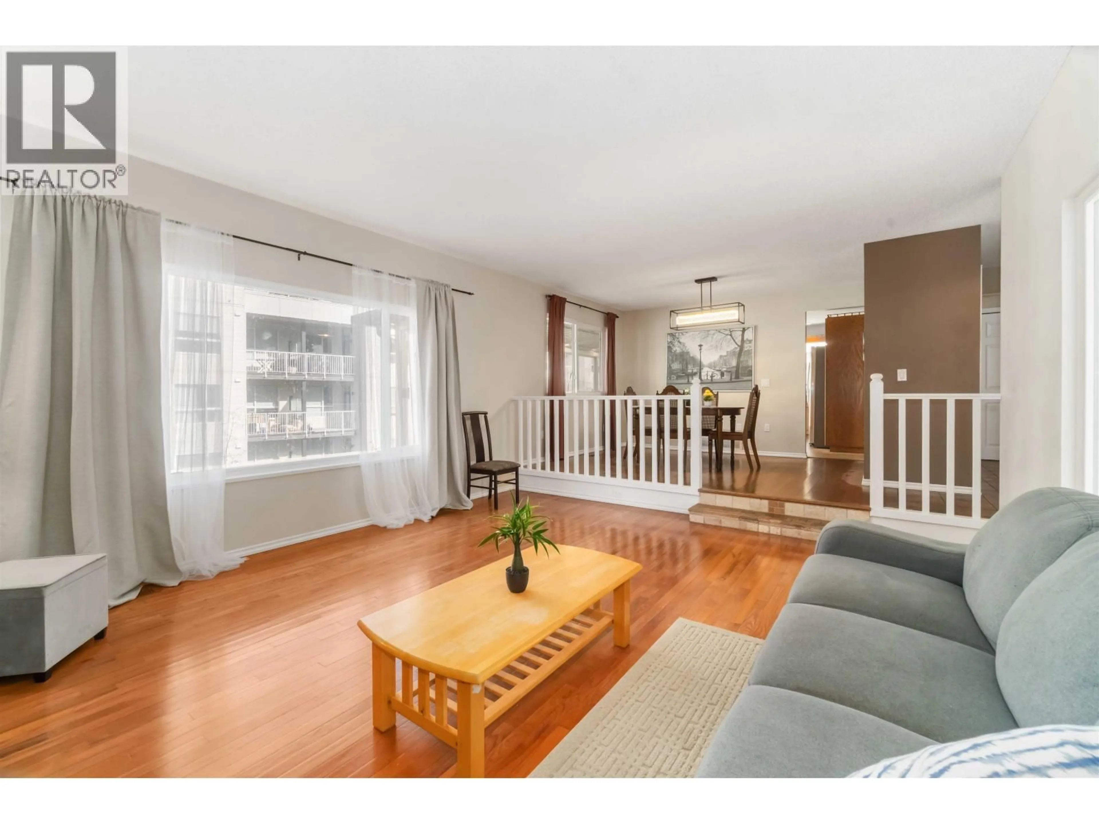Living room with furniture, wood/laminate floor for 171 EDWARD CRESCENT, Port Moody British Columbia V3H3J8