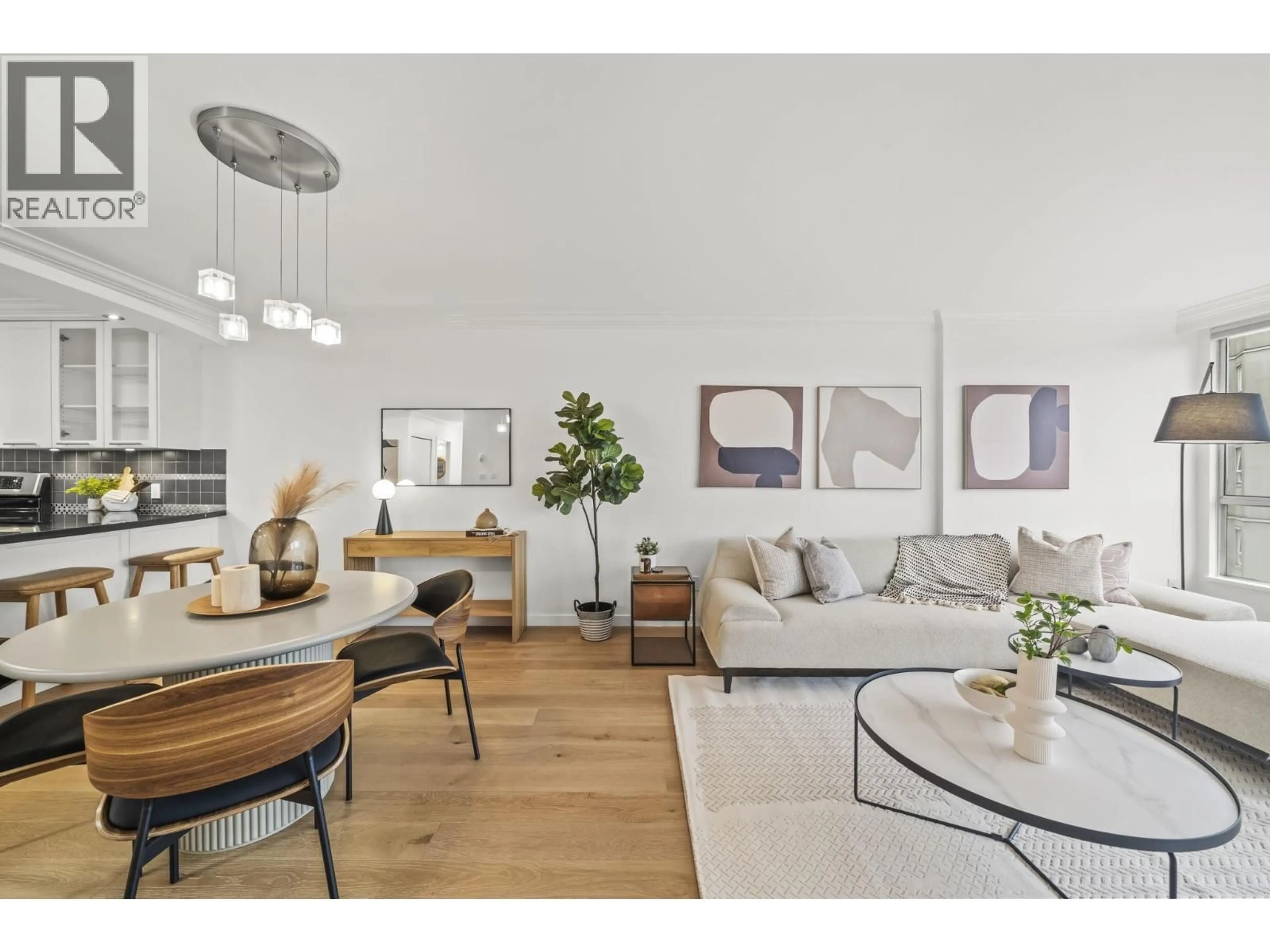 Living room with furniture, wood/laminate floor for 809 - 518 MOBERLY ROAD, Vancouver British Columbia V5Z4G3