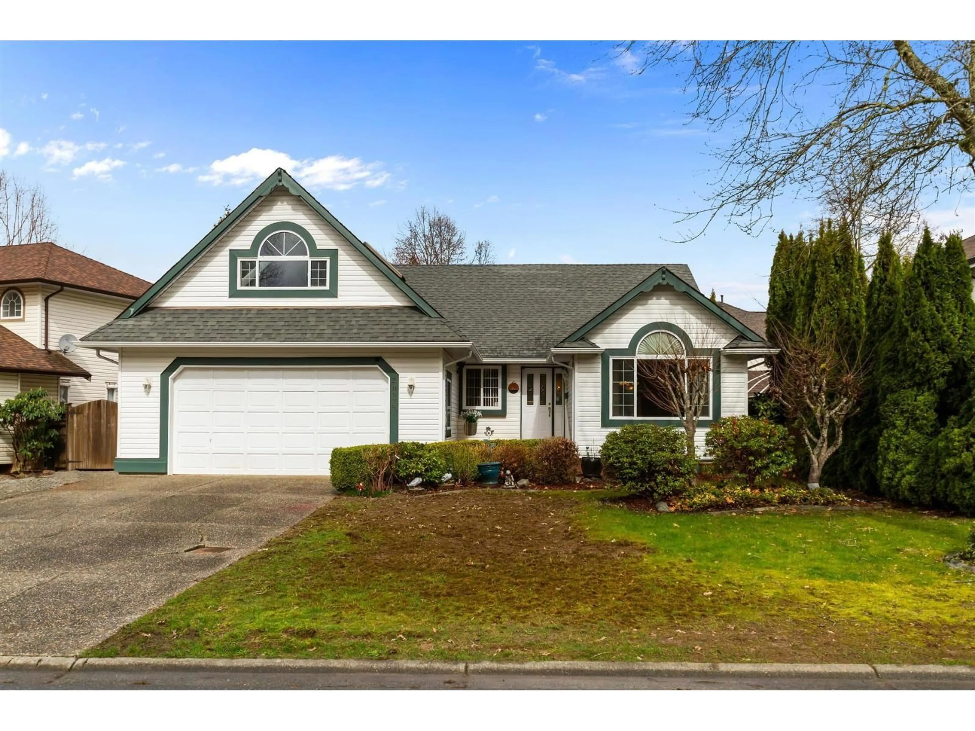 Home with vinyl exterior material, street for 20575 89B AVENUE, Langley British Columbia V1M2P2