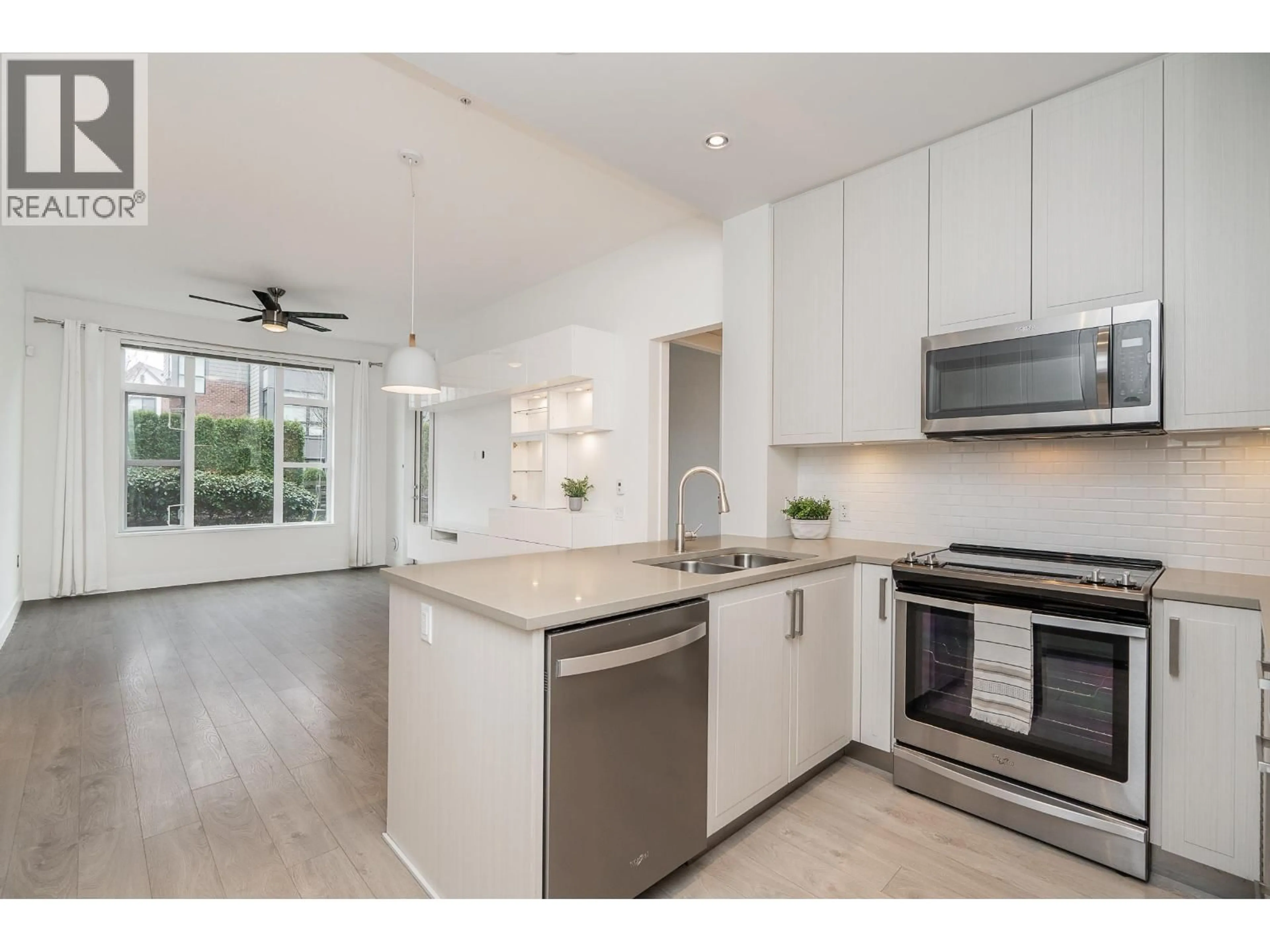 Open concept kitchen, ceramic/tile floor for 107 - 2393 RANGER LANE, Port Coquitlam British Columbia V3B0P5