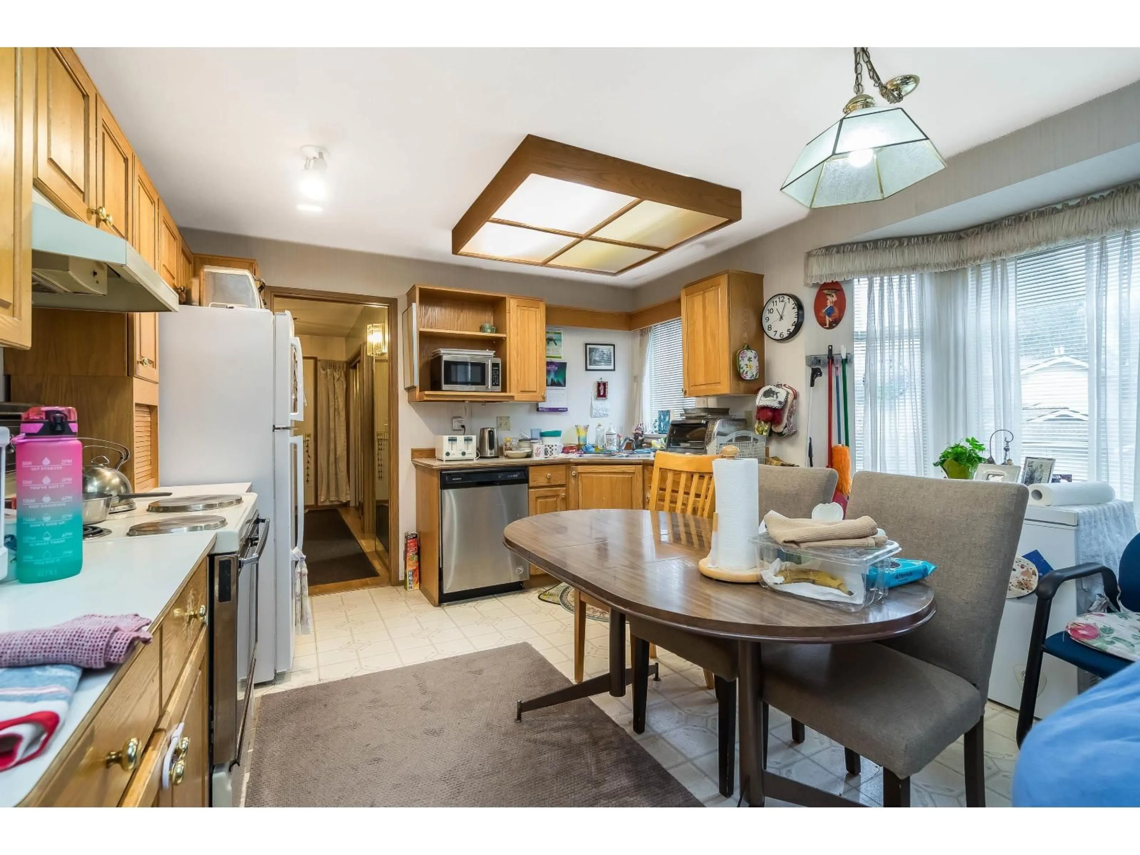 Open concept kitchen, wood/laminate floor for 110 - 10584 153 STREET, Surrey British Columbia V3R9V1