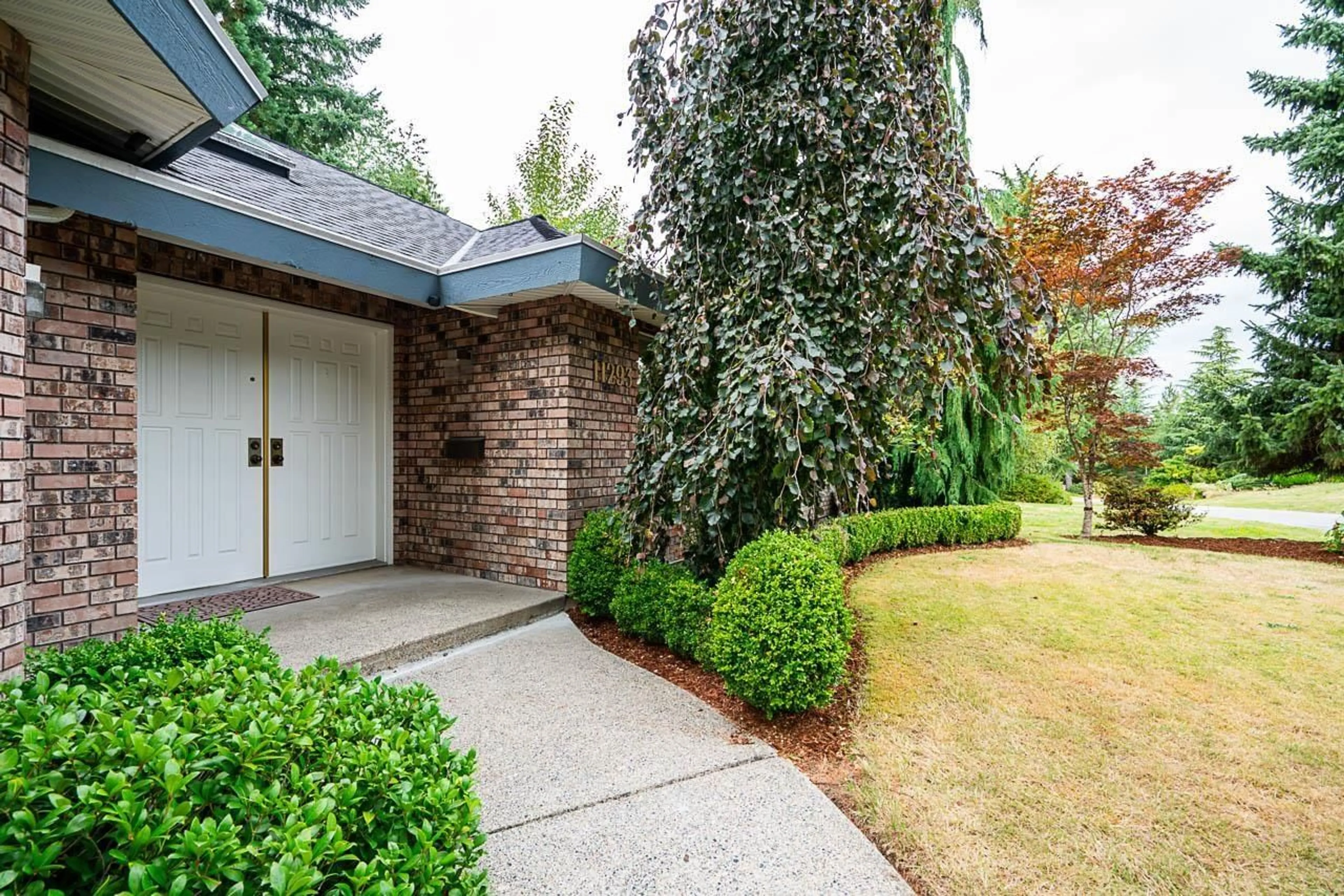 Home with brick exterior material, street for 11293 153A STREET, Surrey British Columbia V3R6H9