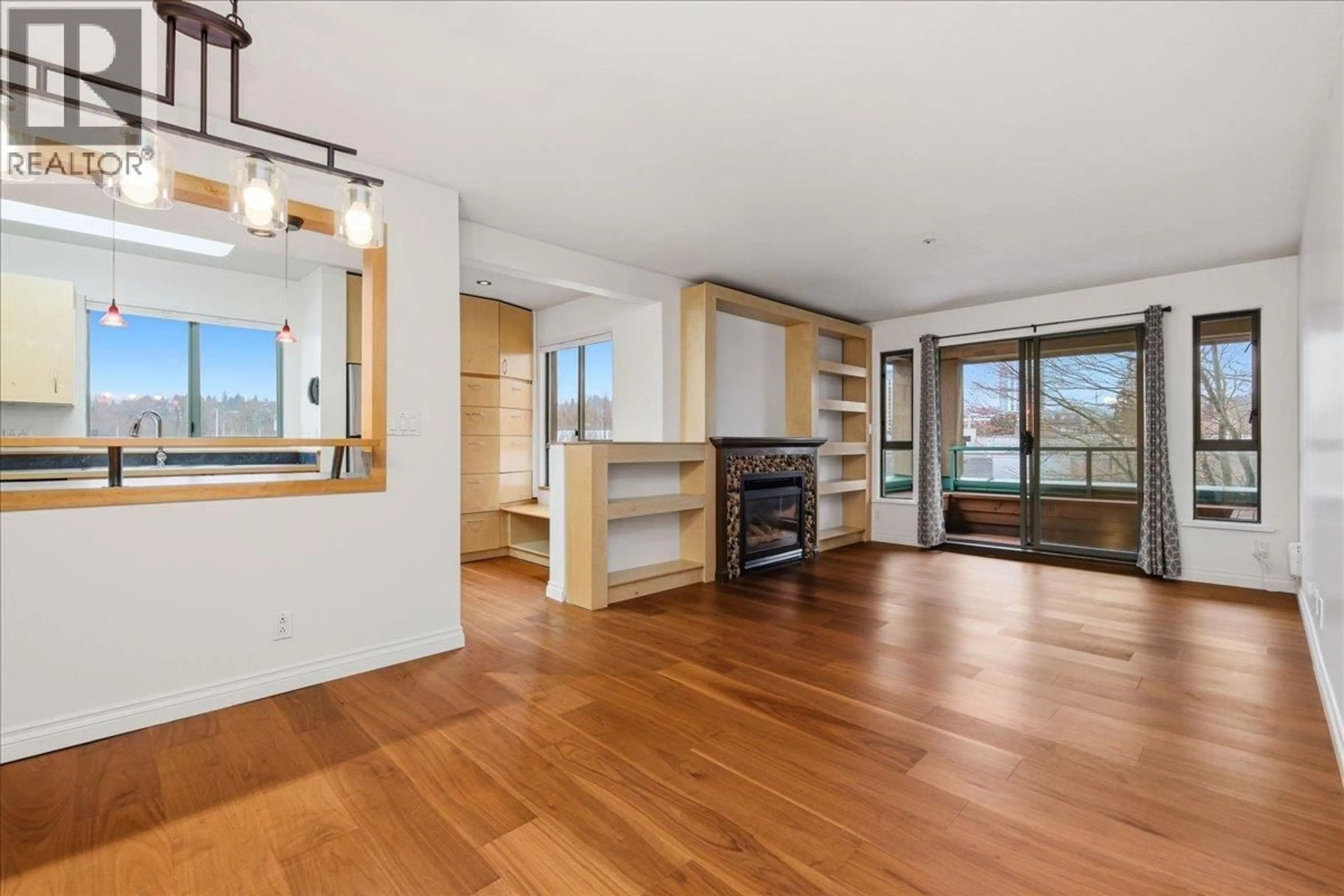 Open concept kitchen, wood/laminate floor for 306 - 223 MOUNTAIN HIGHWAY, North Vancouver British Columbia V7J3V3