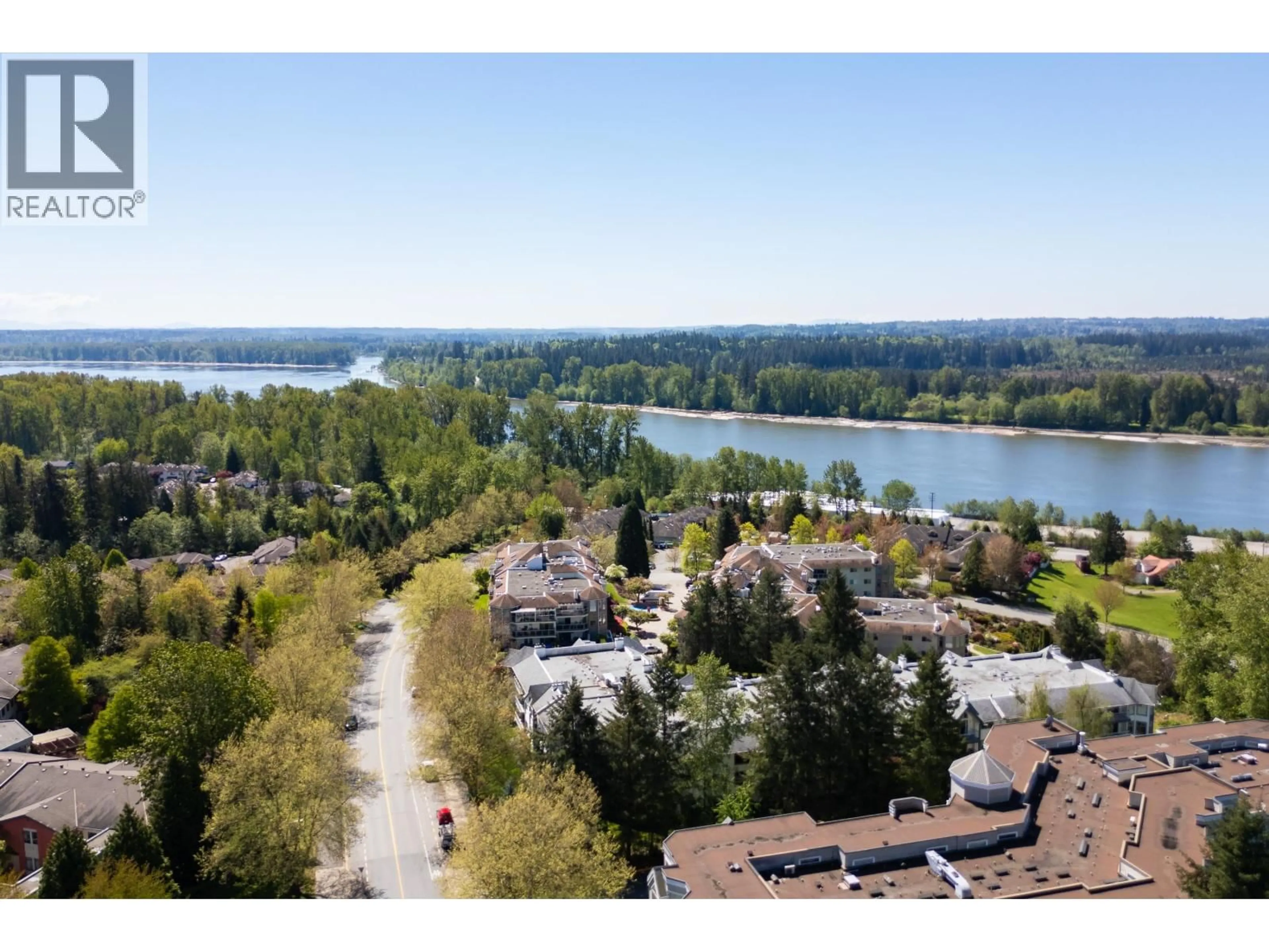 A pic from outside/outdoor area/front of a property/back of a property/a pic from drone, water/lake/river/ocean view for 102 - 11641 227 STREET, Maple Ridge British Columbia V2X9J6
