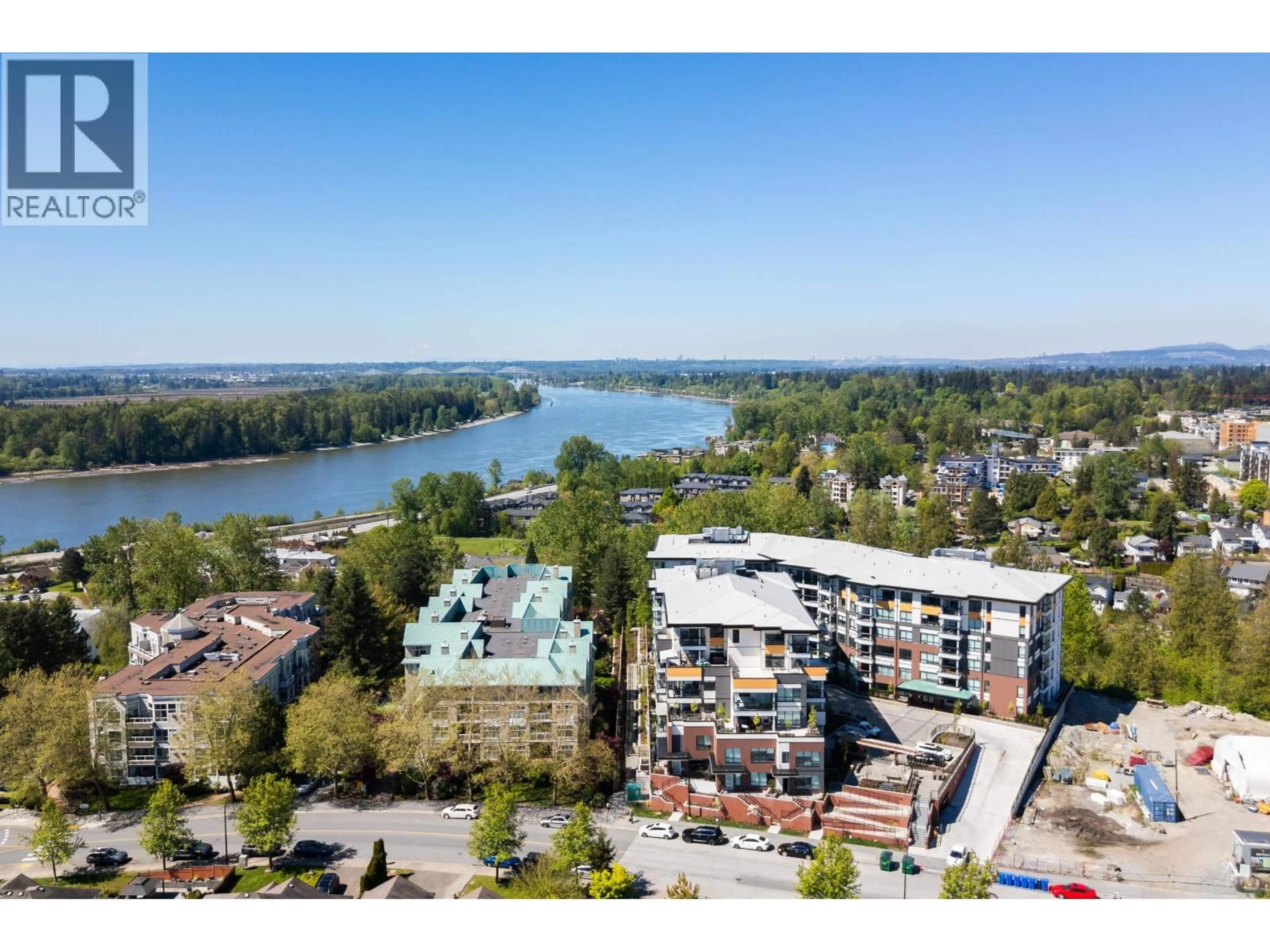 A pic from outside/outdoor area/front of a property/back of a property/a pic from drone, water/lake/river/ocean view for 102 - 11641 227 STREET, Maple Ridge British Columbia V2X9J6
