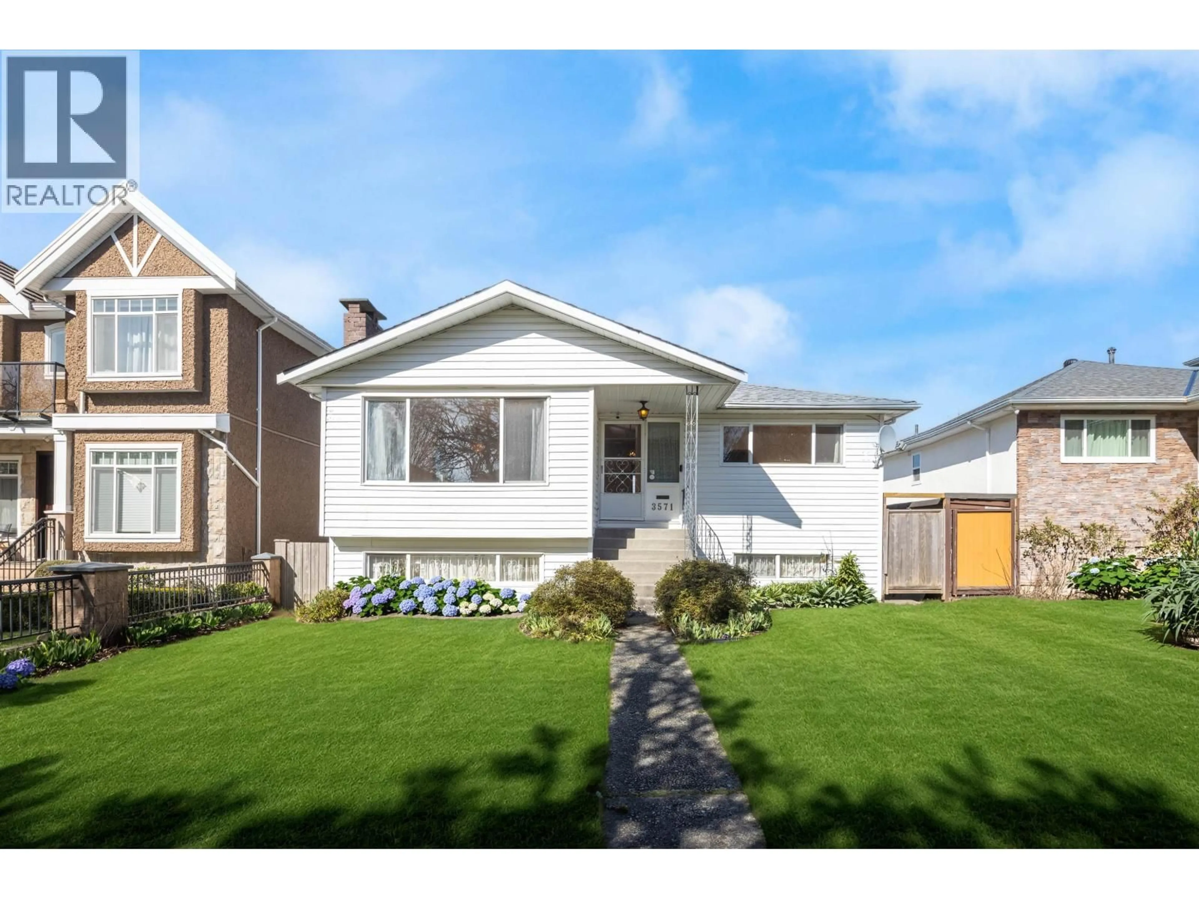 Home with vinyl exterior material, street for 3571 46TH AVENUE, Vancouver British Columbia V5S1B7