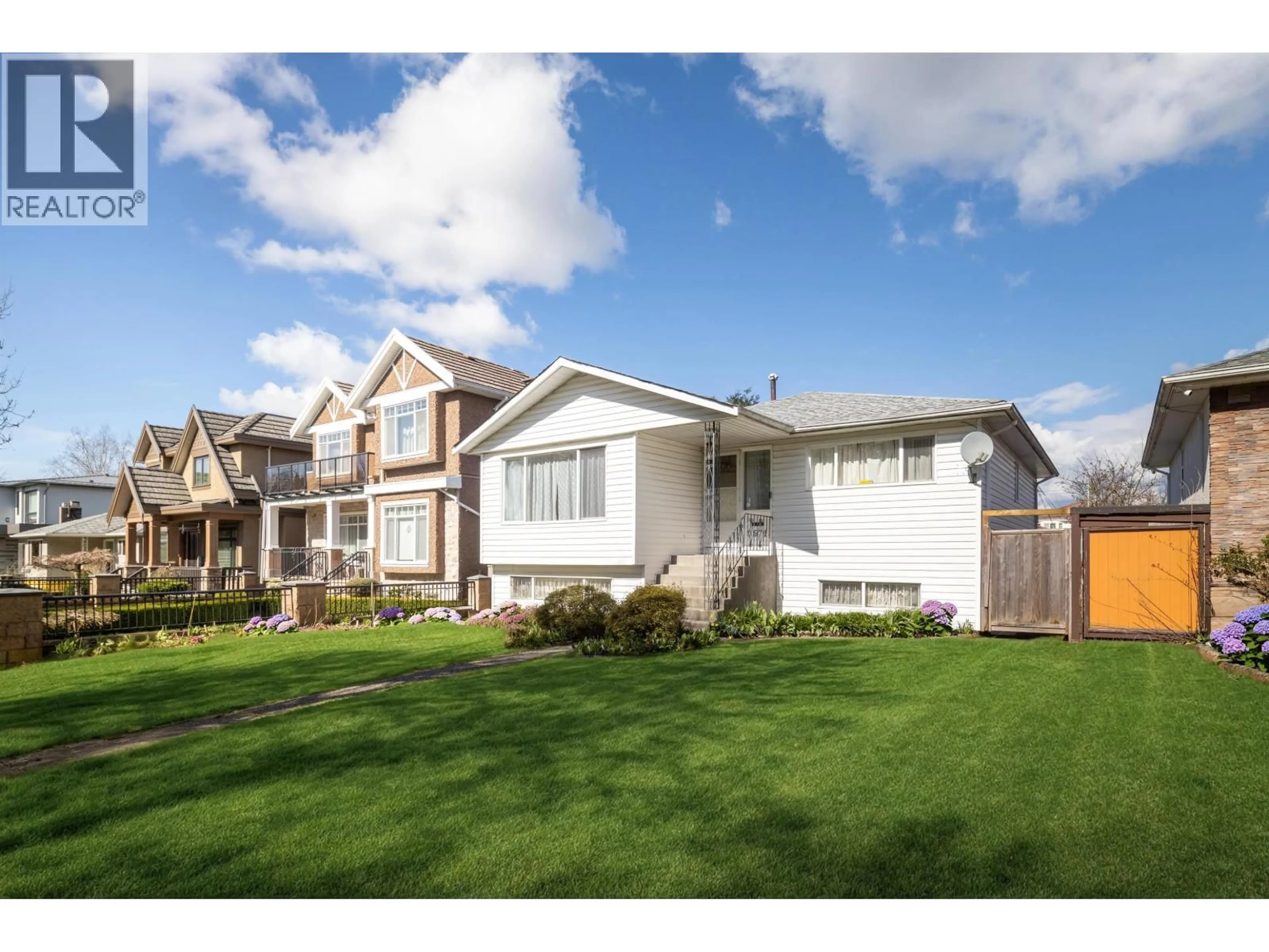 Home with vinyl exterior material, street for 3571 46TH AVENUE, Vancouver British Columbia V5S1B7