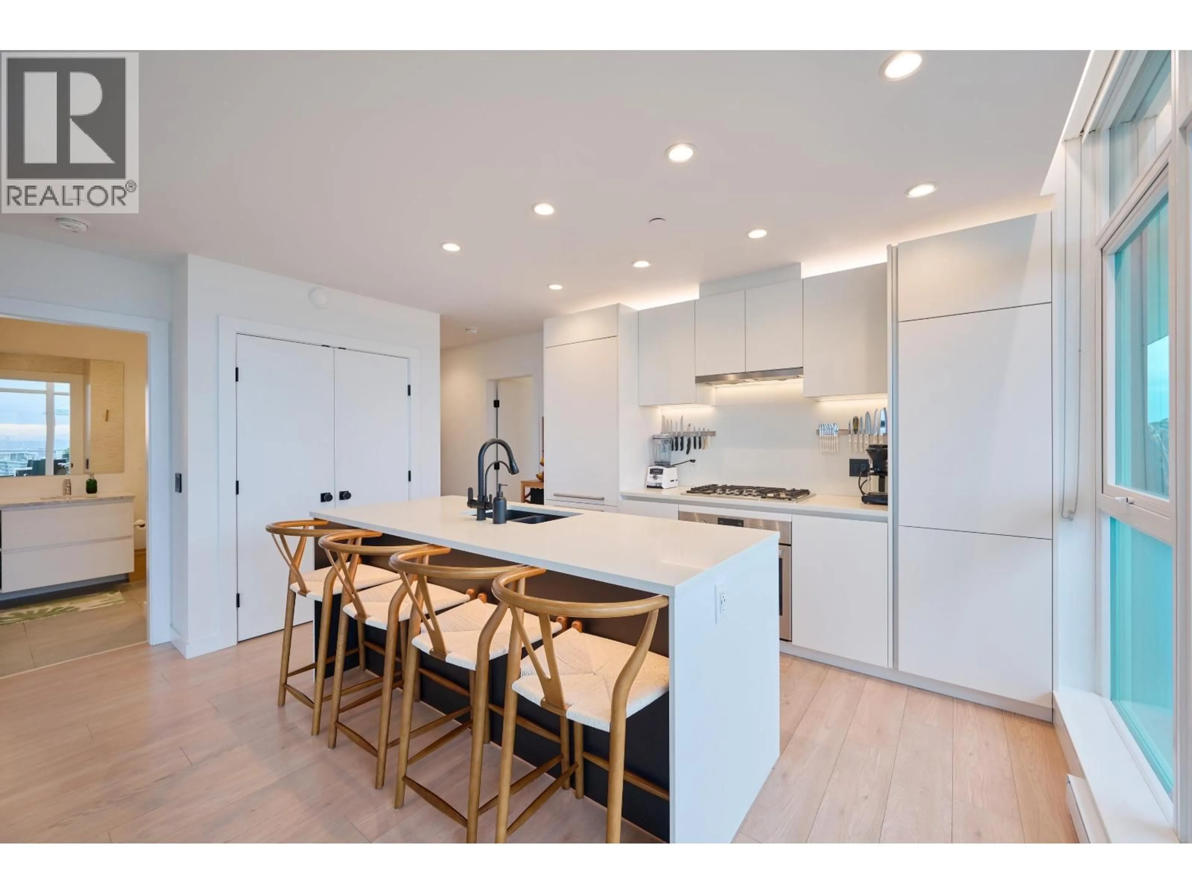 Open concept kitchen, wood/laminate floor for 2802/03 - 652 WHITING WAY, Coquitlam British Columbia V3J0K3