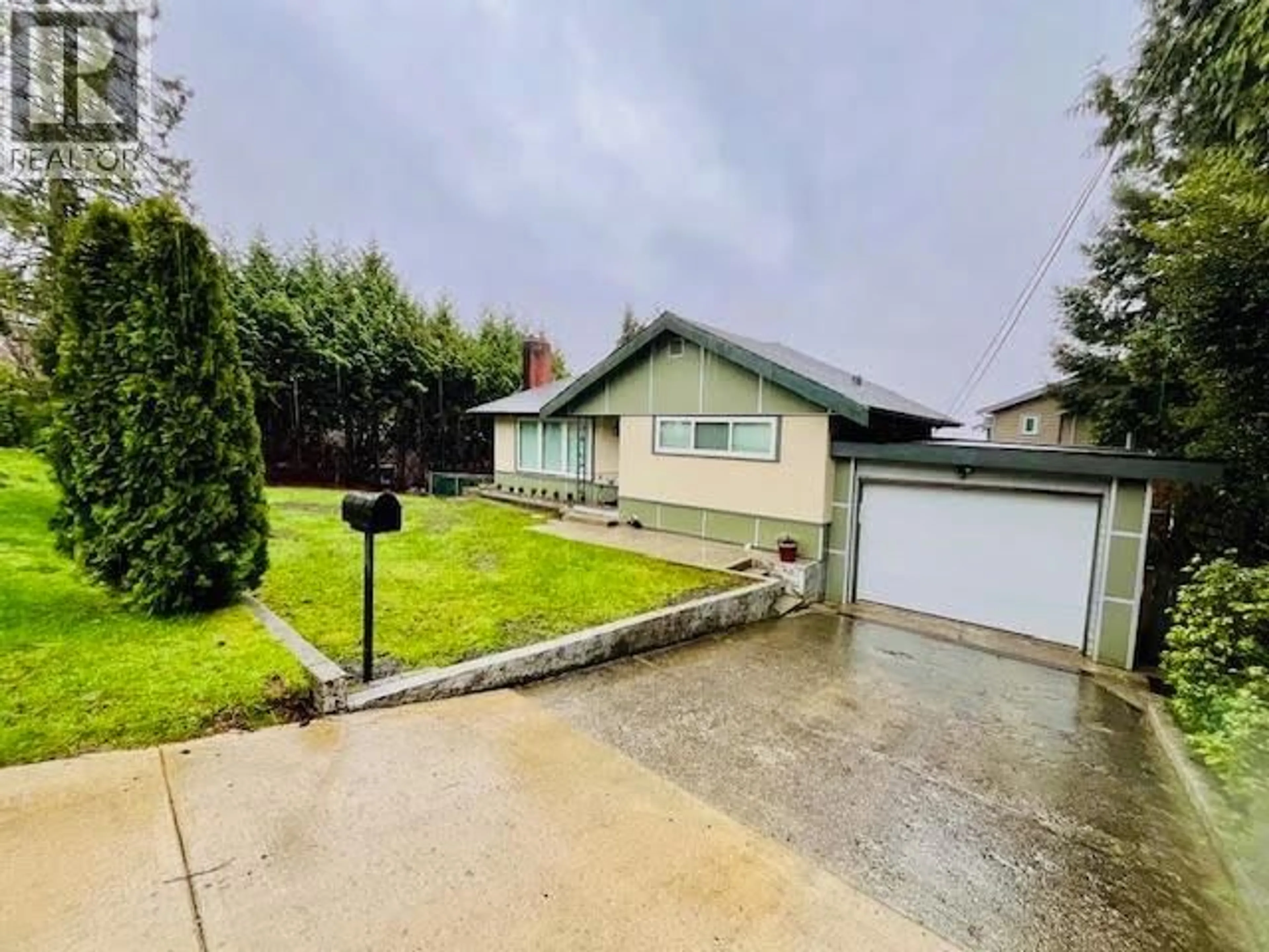 A pic from outside/outdoor area/front of a property/back of a property/a pic from drone, street for 1314 THOMAS AVENUE, Coquitlam British Columbia V3K2L5