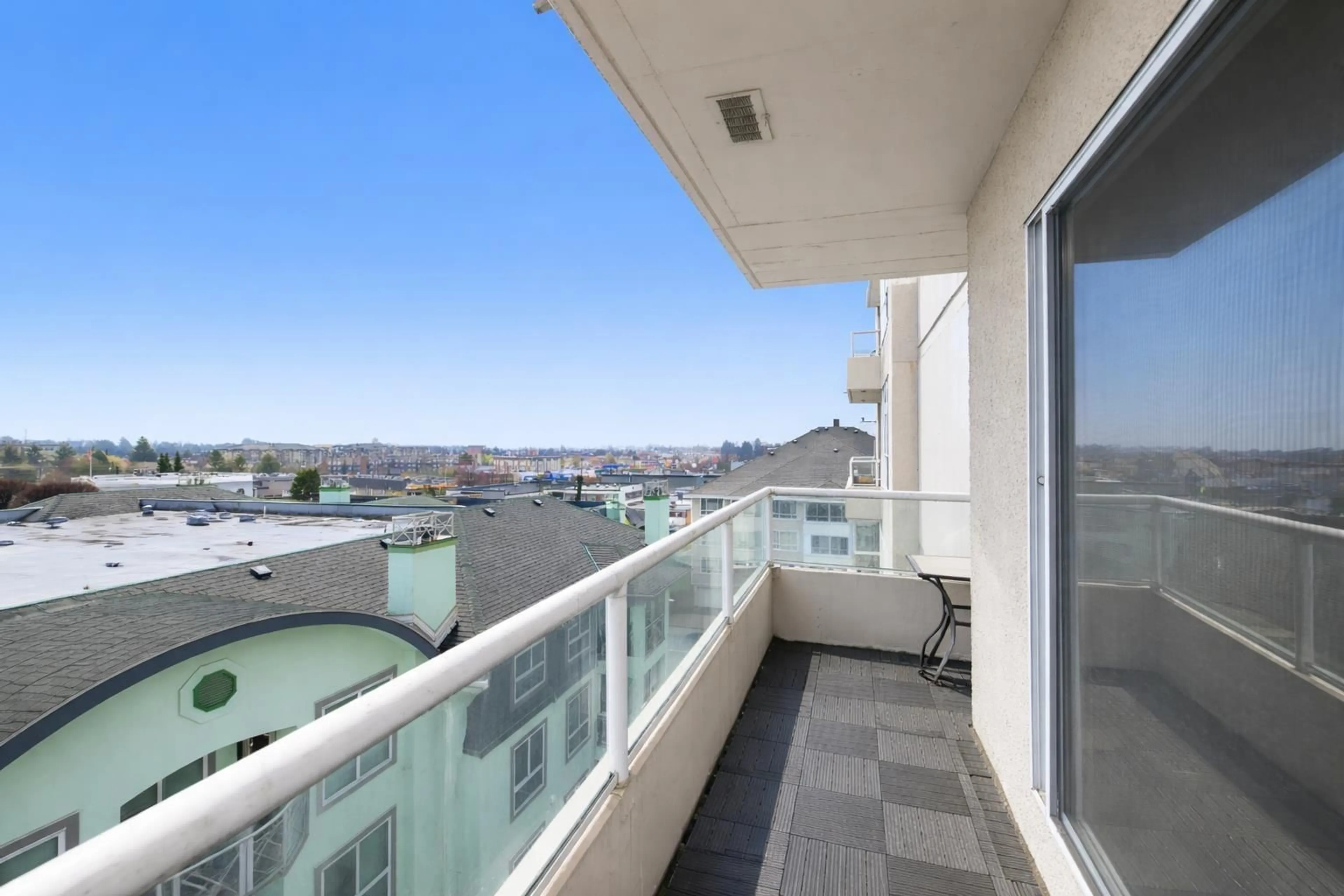 Balcony in the apartment, city buildings view from balcony for 602 - 45765 SPADINA AVENUE, Chilliwack British Columbia V2P1T5