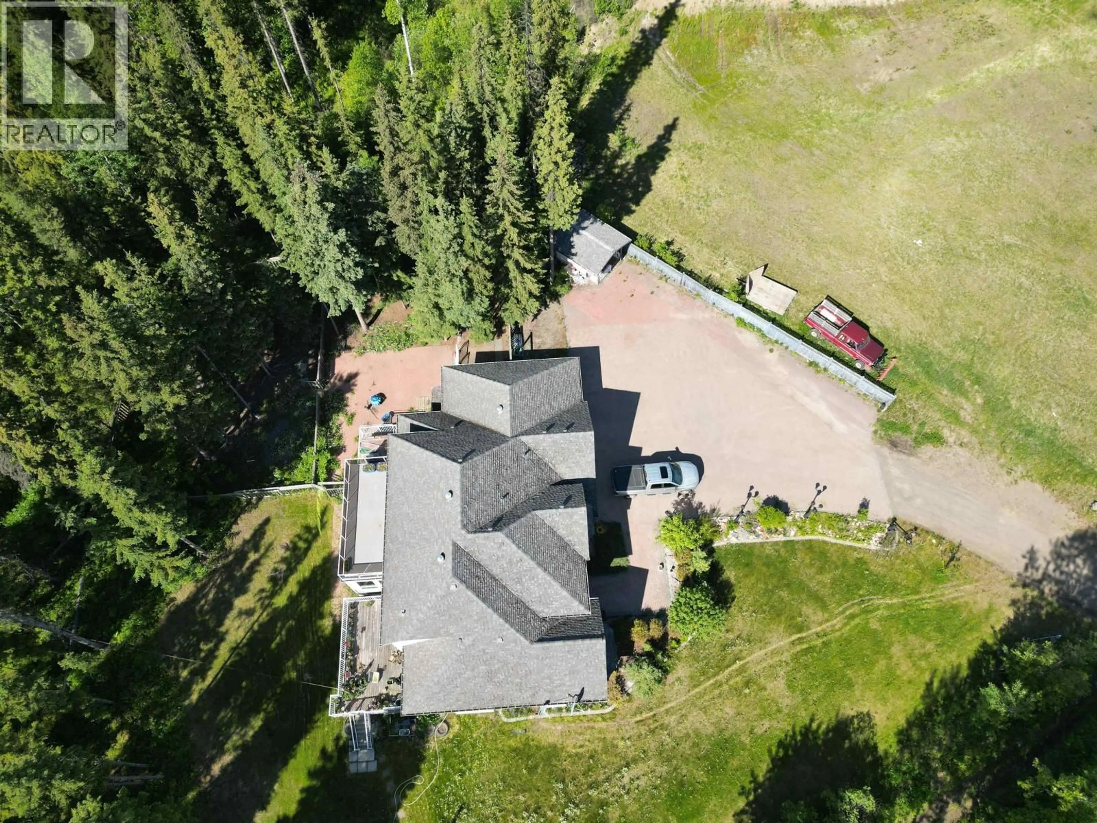 A pic from outside/outdoor area/front of a property/back of a property/a pic from drone, mountain view for 585 5TH AVENUE, Burns Lake British Columbia V0J1E0