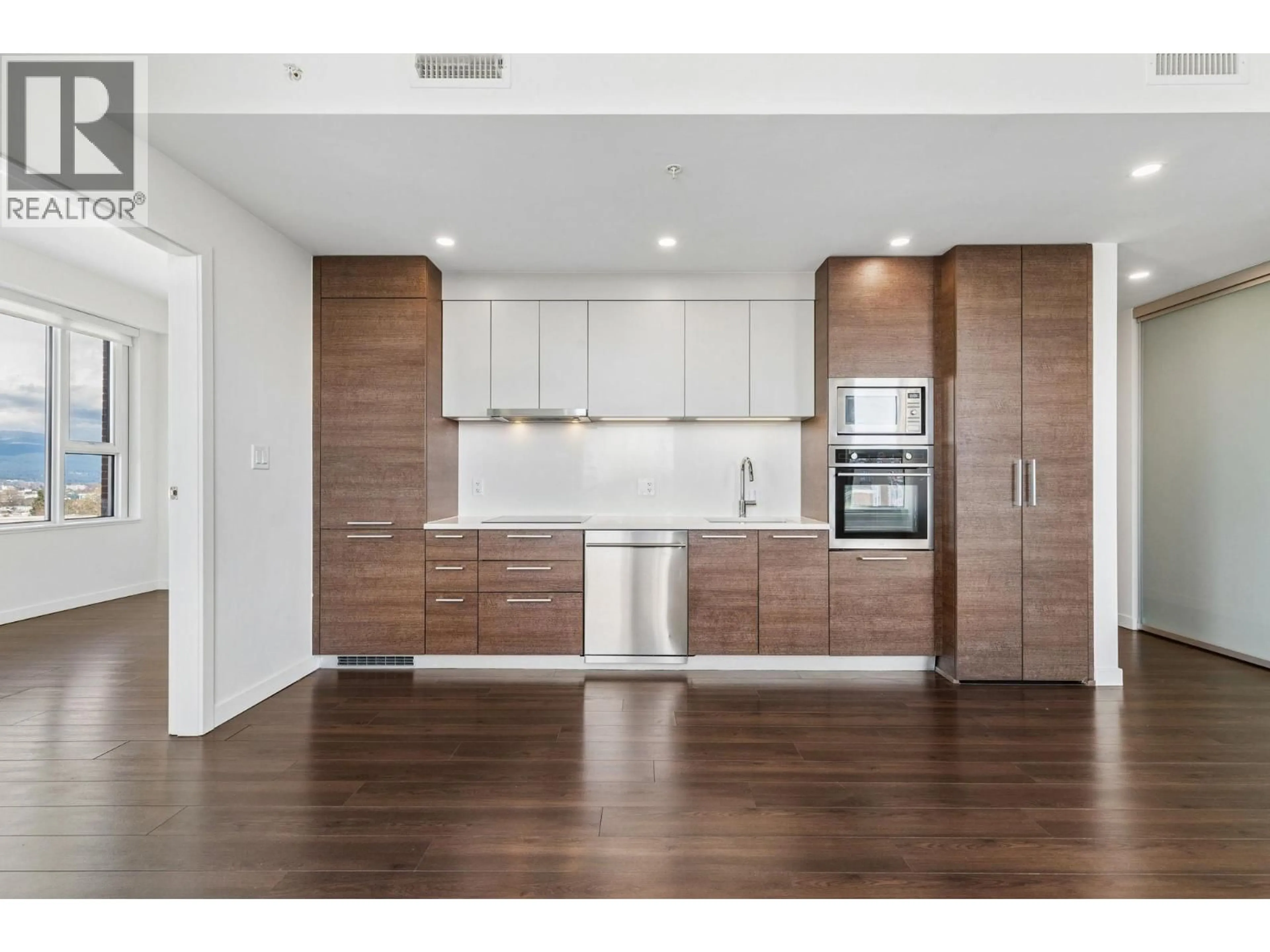 Open concept kitchen, wood/laminate floor for 501 - 2508 WATSON STREET, Vancouver British Columbia V5T3G9