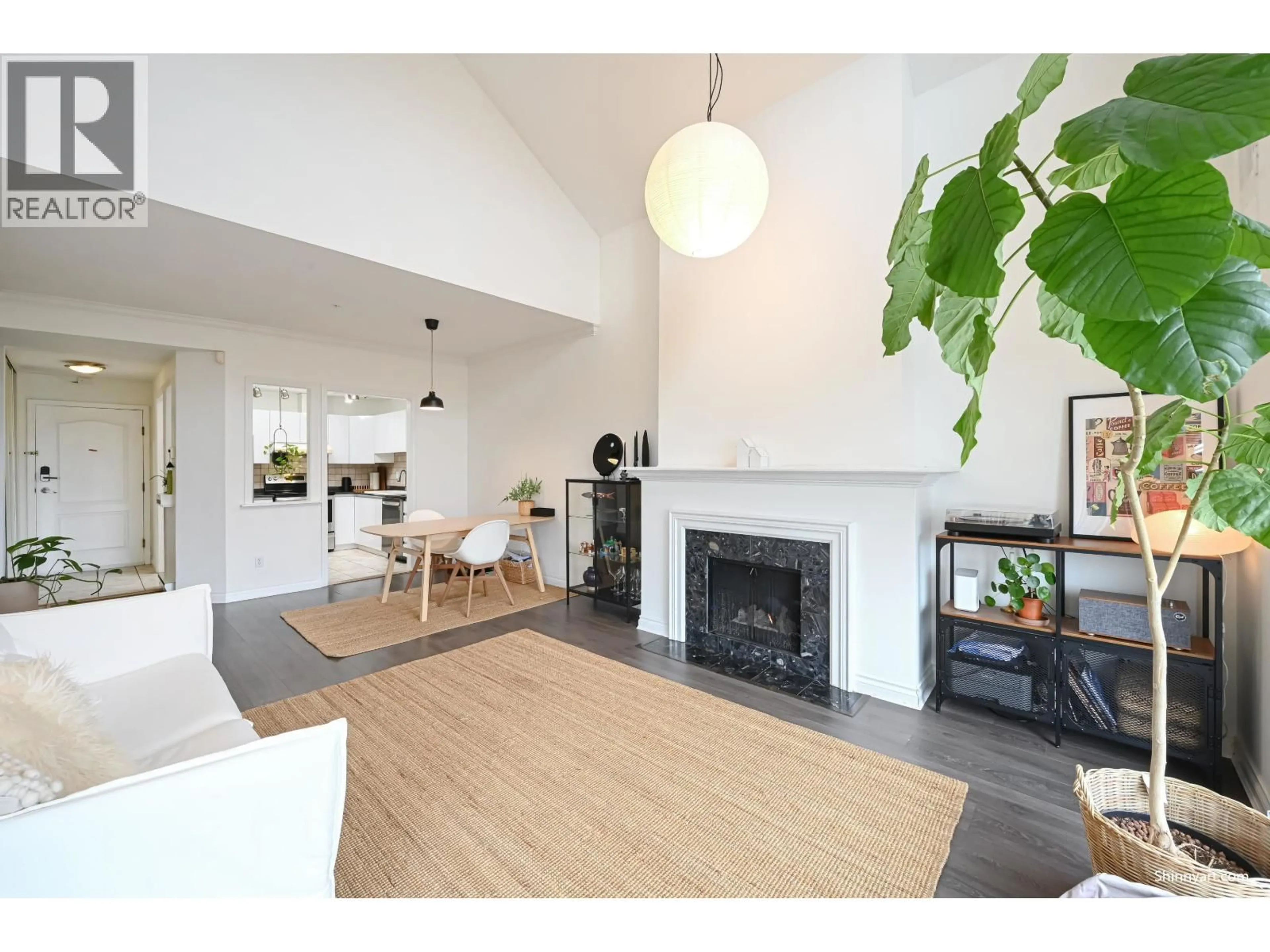 Living room with furniture, wood/laminate floor for 308 - 7633 ST. ALBANS ROAD, Richmond British Columbia V6Y3W7