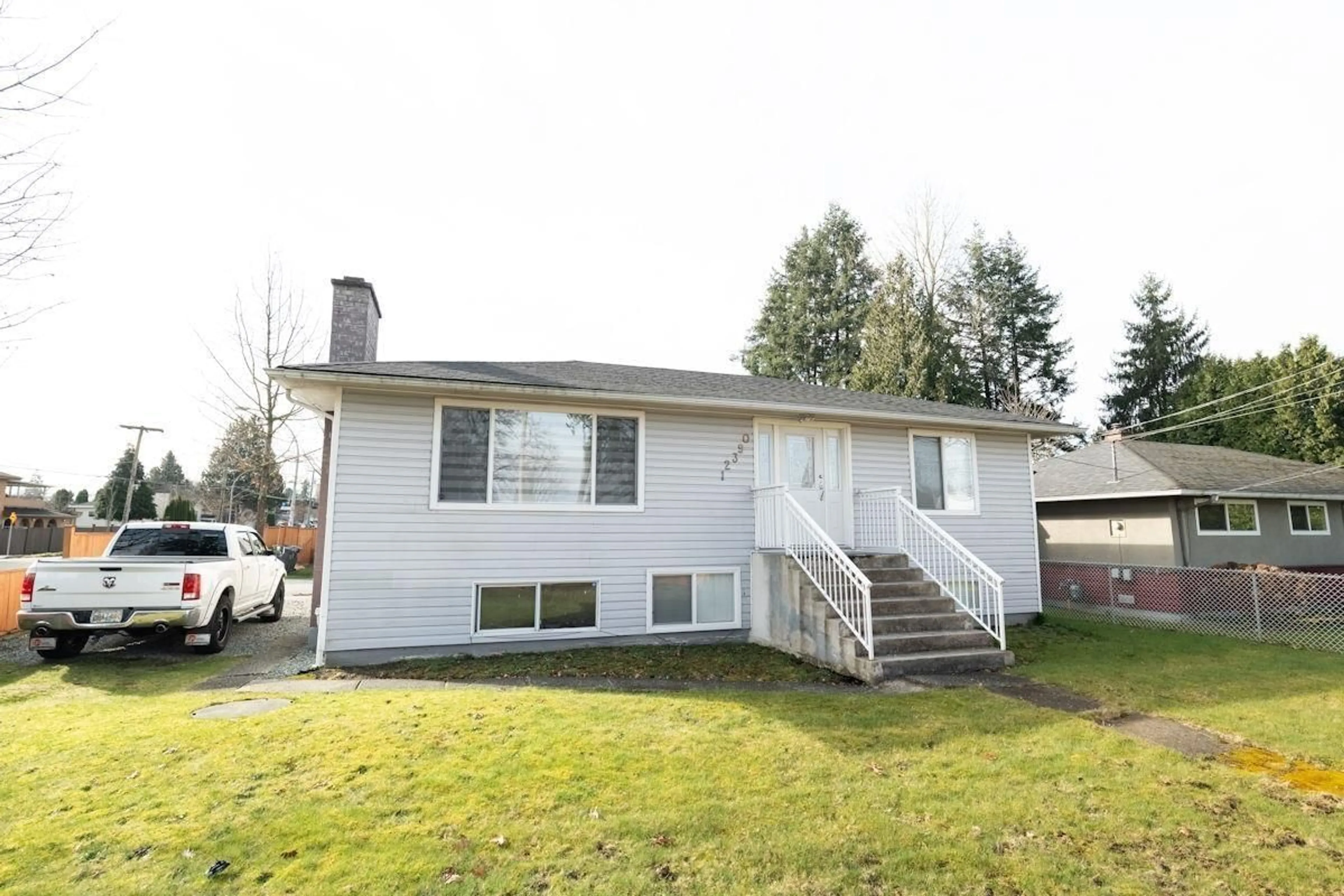 Home with vinyl exterior material, street for 12390 96 AVENUE, Surrey British Columbia V3V1W7