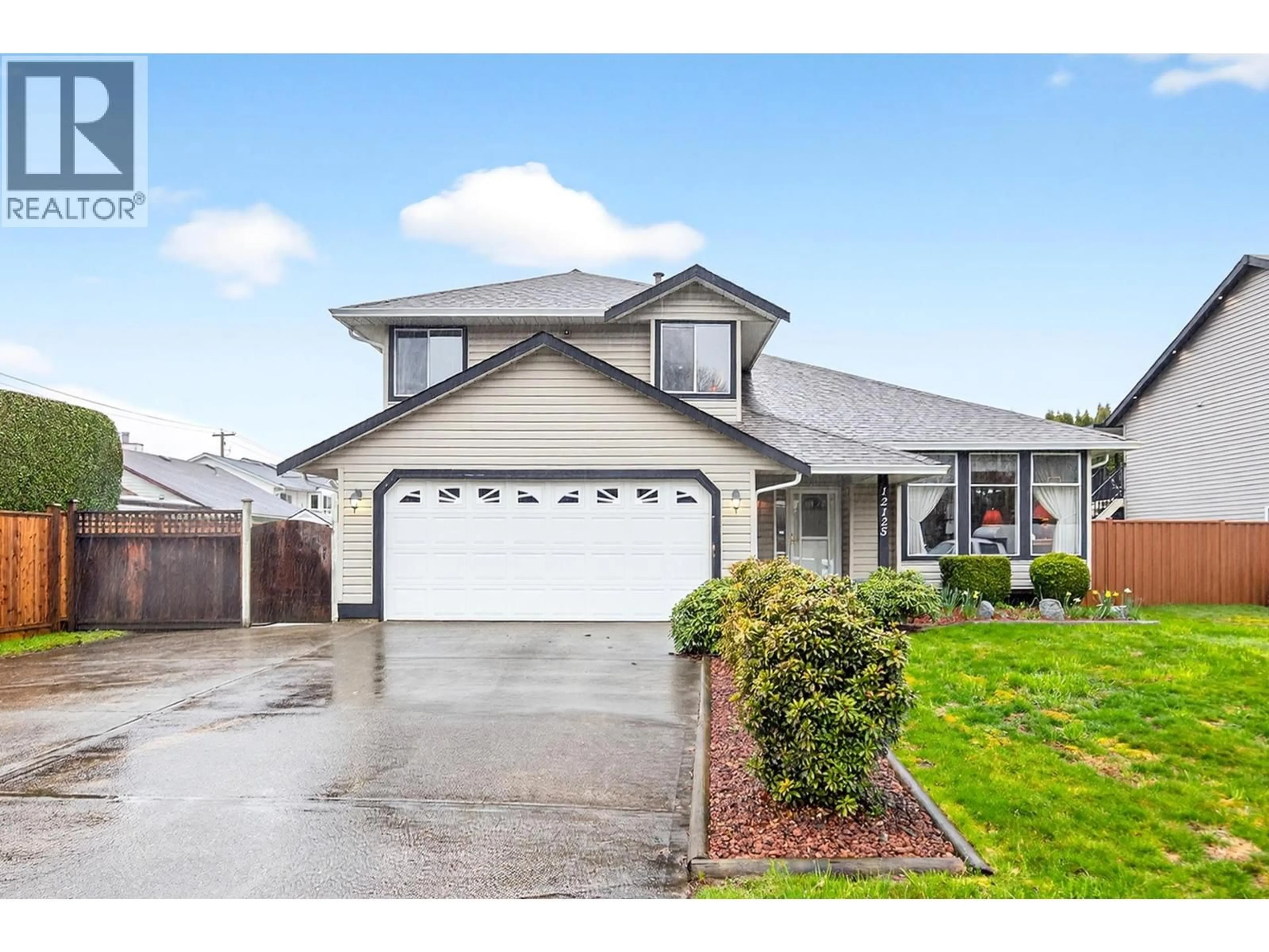 Home with vinyl exterior material, street for 12125 189A STREET, Pitt Meadows British Columbia V3Y2K5