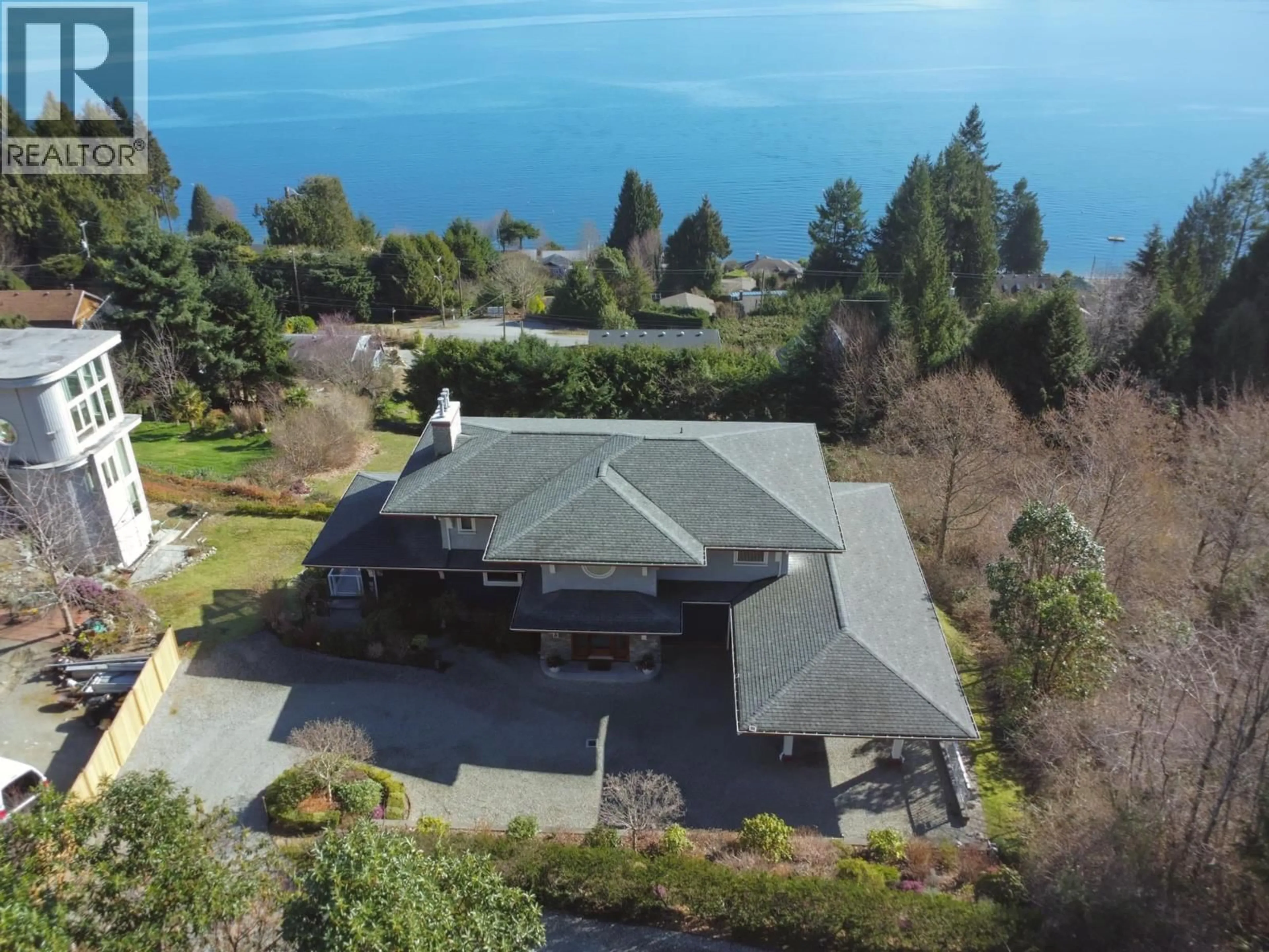 A pic from outside/outdoor area/front of a property/back of a property/a pic from drone, water/lake/river/ocean view for 1128 TWIN ISLE DRIVE, Gibsons British Columbia V0N1V1