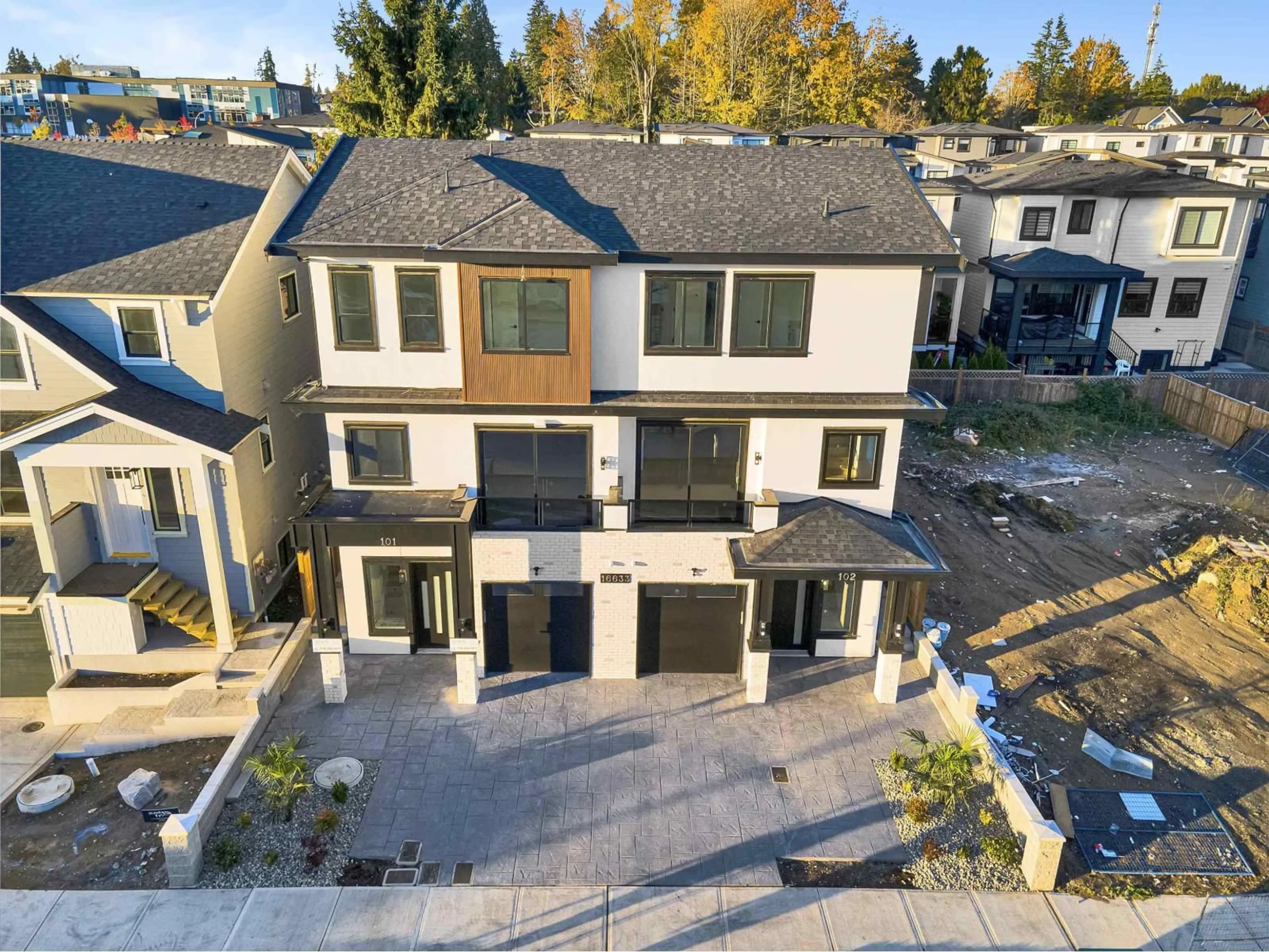 A pic from outside/outdoor area/front of a property/back of a property/a pic from drone, mountain view for 102 - 16633 18A AVENUE, Surrey British Columbia V3Z1A2