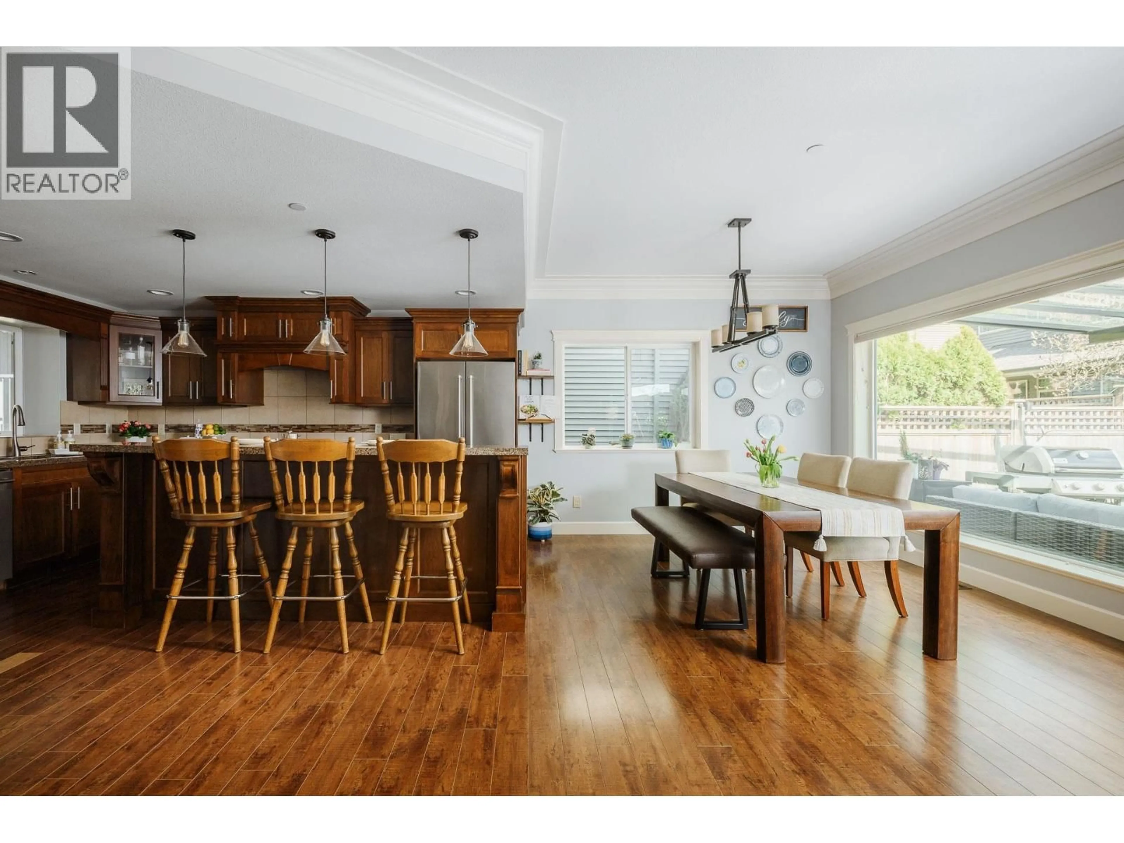 Open concept kitchen, wood/laminate floor for 11216 236 STREET, Maple Ridge British Columbia V2W0C8